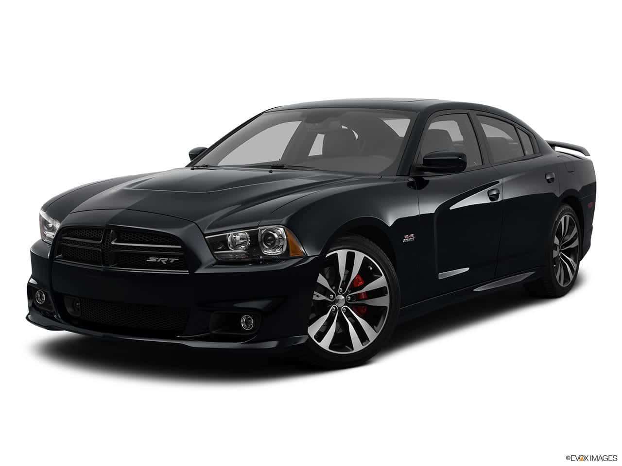 道奇 桌布 壁紙 — 一輛時尚的黑色Dodge Charger SRT轎車，配備銀色煞車卡鉗和合金輪圈，在工作室燈光下展示。