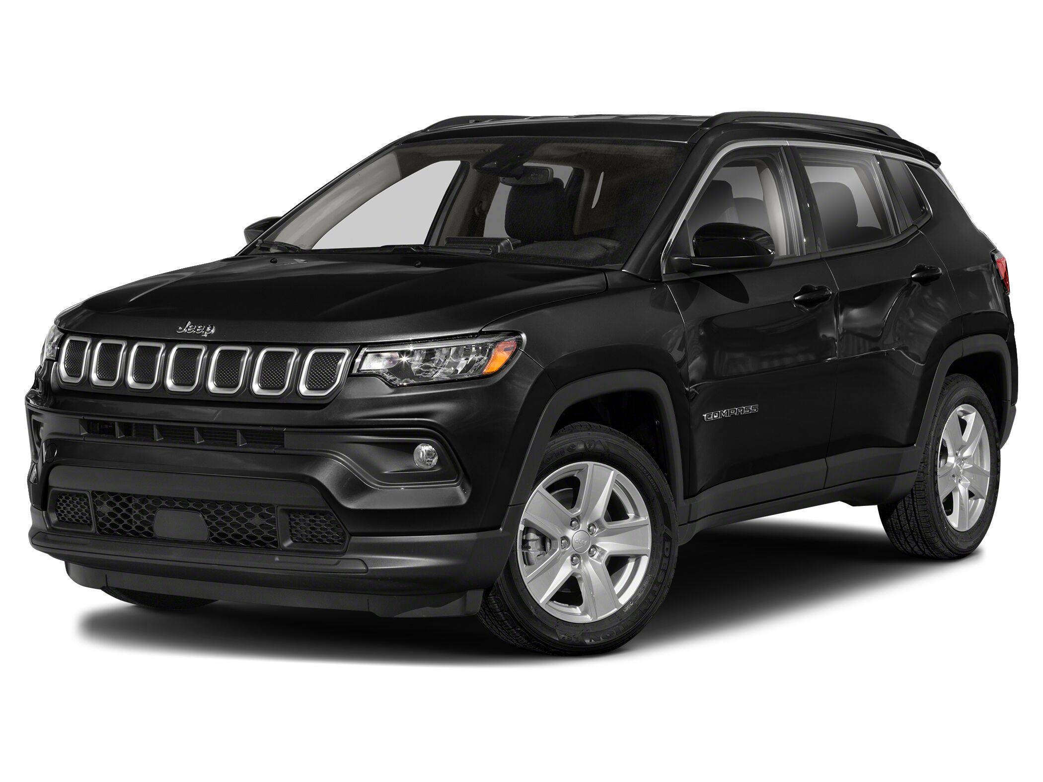 黑色美學 桌布 壁紙 — 一輛時尚的黑色Jeep Compass SUV，在攝影棚燈光下展示，帶有鍍鉻飾邊和銀色合金輪圈。