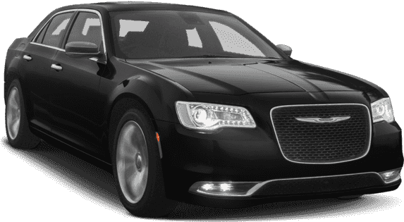 克萊斯勒 桌布 壁紙 — 一輛時尚的黑色克萊斯勒轎車，帶有鍍鉻飾邊和發光的頭燈，在純白背景前傲然矗立。