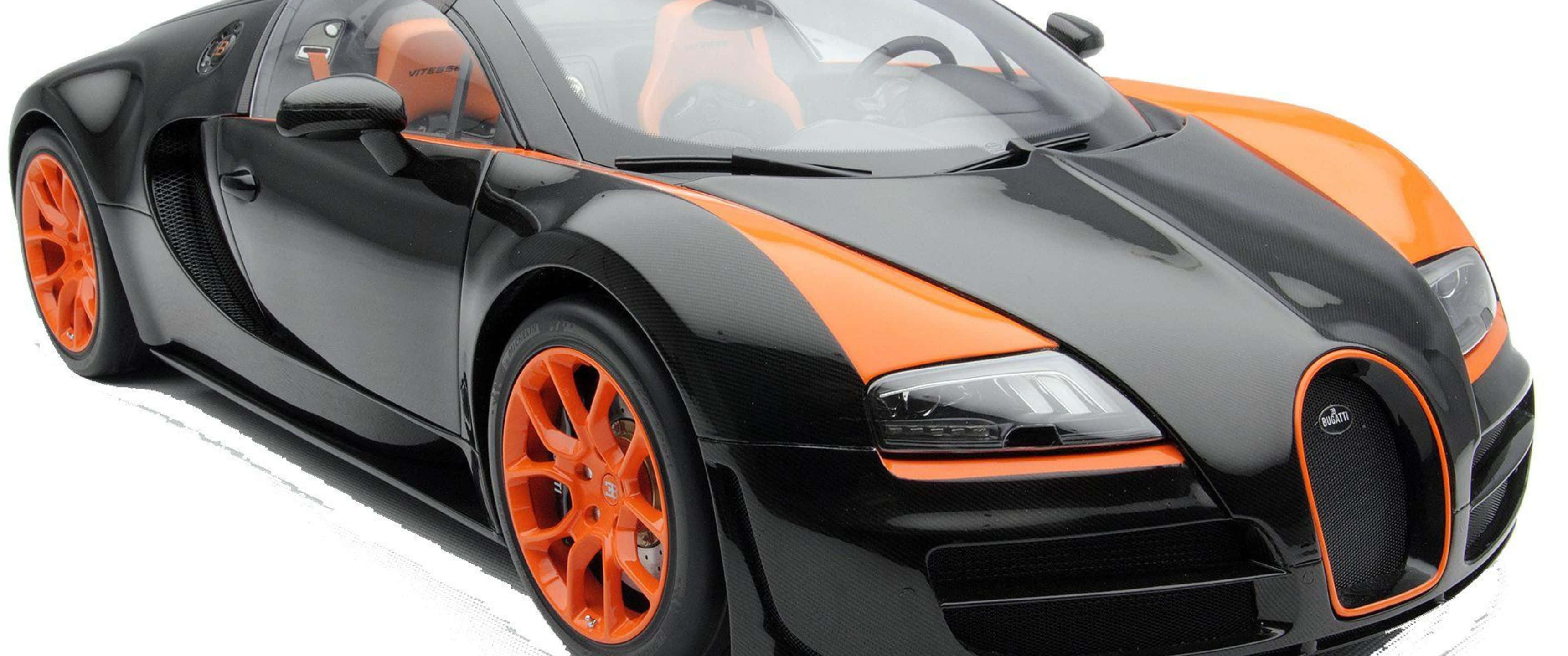 3440x1440p Bugatti 桌布 壁紙 — 一輛時尚的黑色和橙色Bugatti Veyron跑車，配以充滿活力的橙色輪圈和內飾，在白色背景下的工作室拍攝。