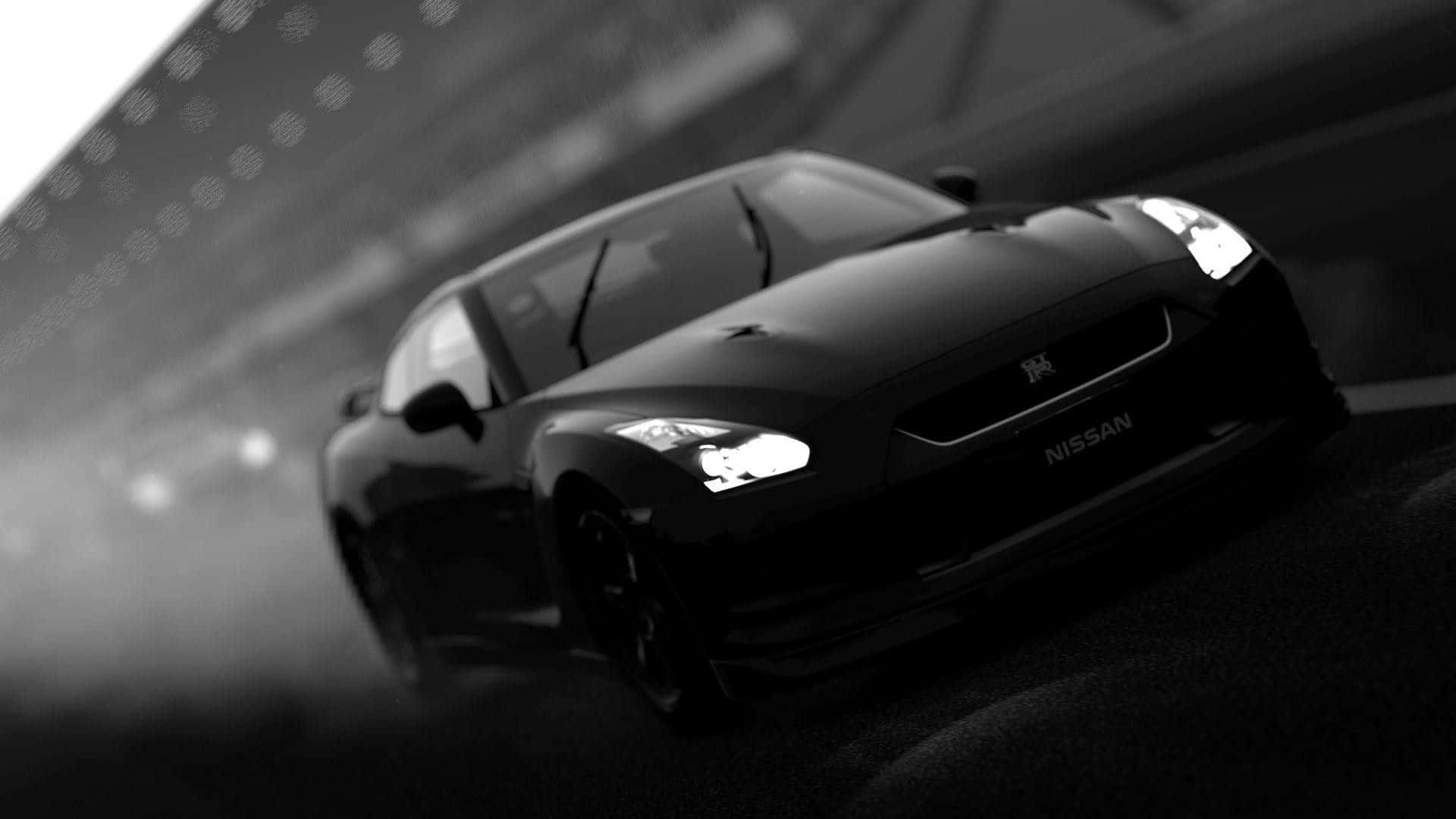 Black And White Car 桌布 壁紙 — 一輛時尚的黑色日產GT-R在模糊的城市隧道中疾馳，車頭燈閃爍，劃破迷霧般的黑暗。