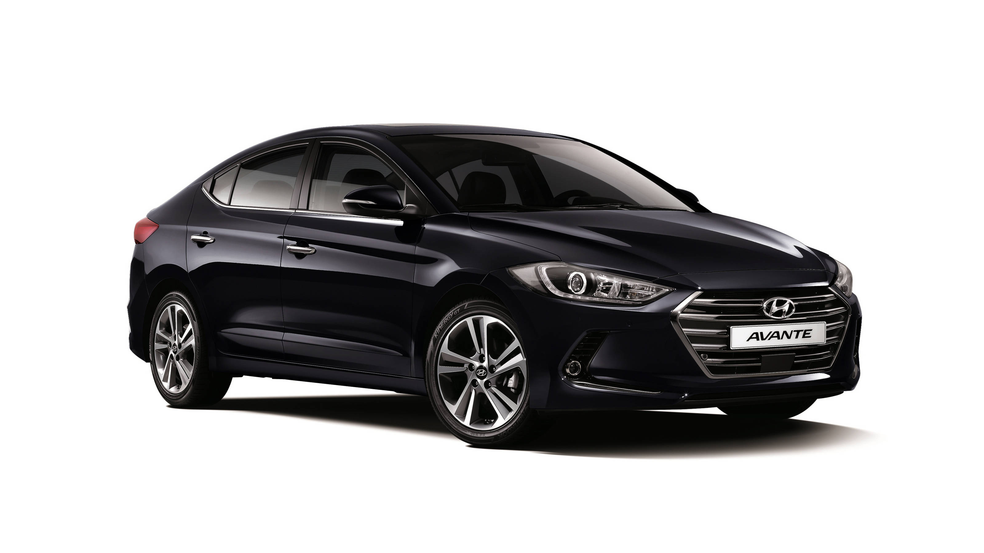 Hyundai 桌布 壁紙 — 一輛時尚的黑色現代Avante轎車在工作室燈光下以乾淨的白色背景展示。