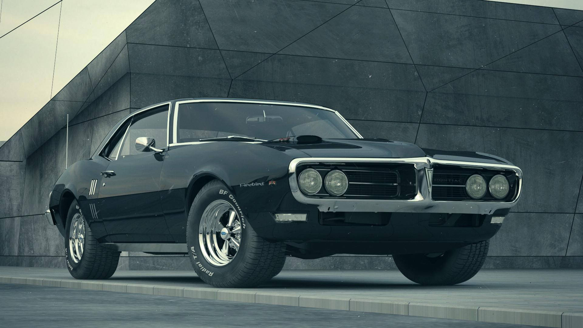 Pontiac 桌布 壁紙 — 一輛時尚的黑色經典肌肉車，帶有鍍鉻裝飾，停放在現代幾何混凝土牆前。