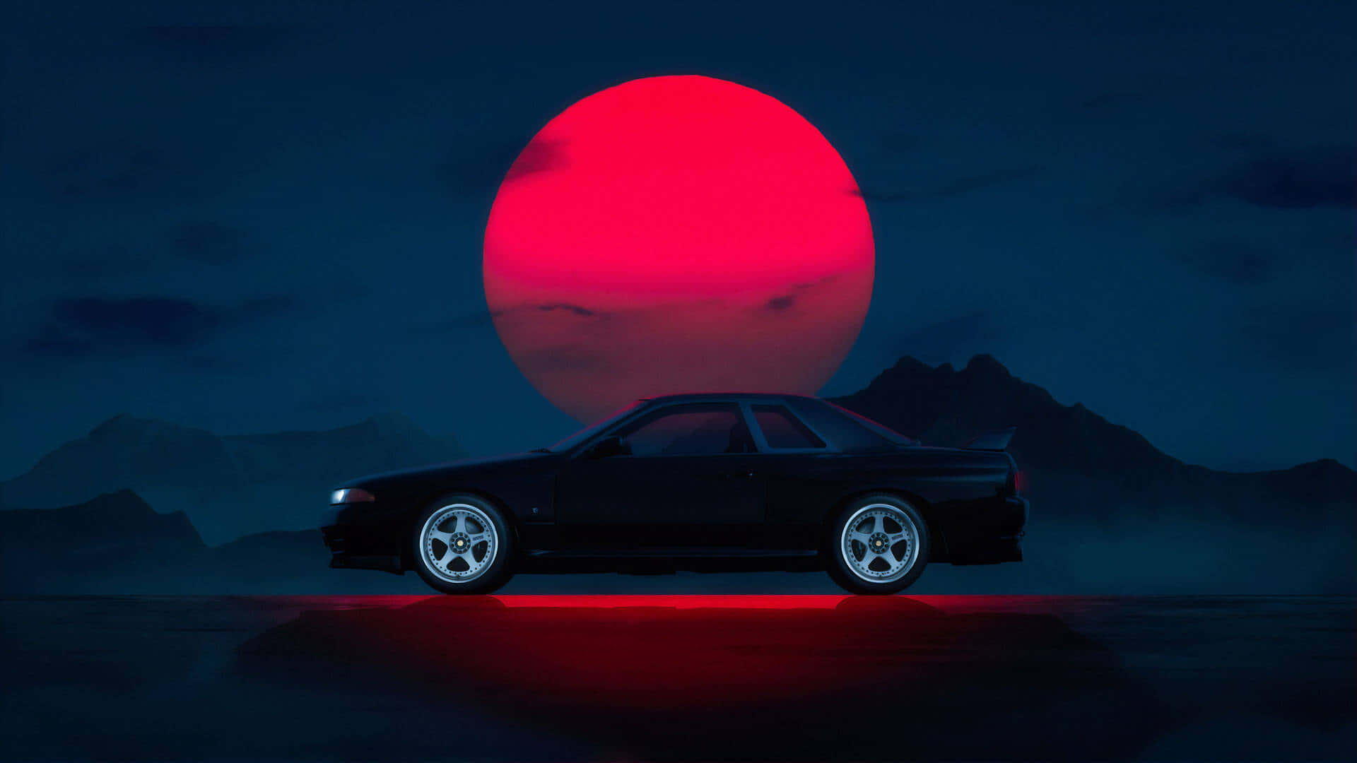 R33 GT-R 桌布 壁紙 — 一輛時尚的黑色跑車在夜間以霧氣繚繞的山脈上空巨大的紅色月亮為背景形成剪影。