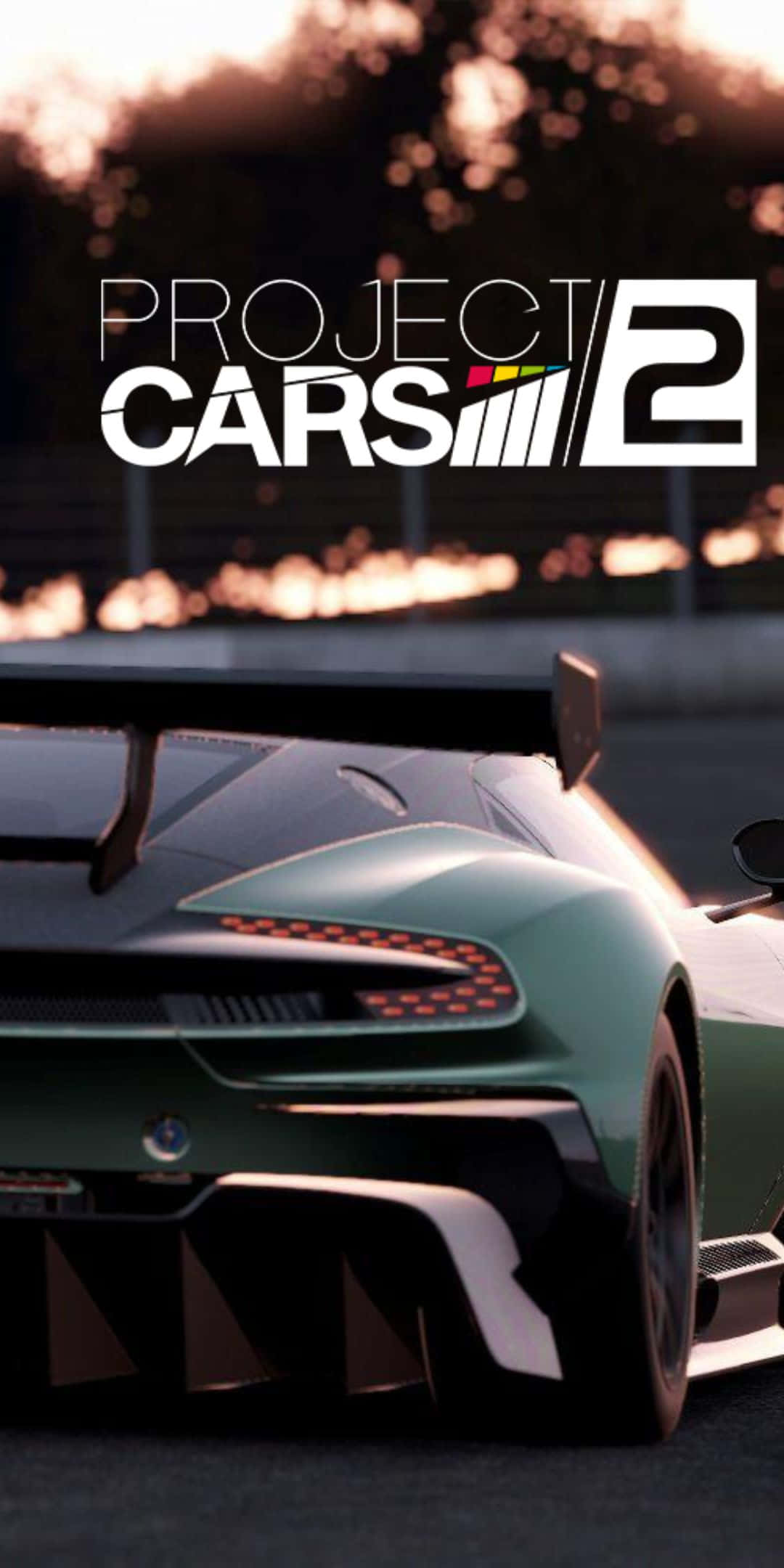 Pixel 3 Project Cars 2 桌布 壁紙 — 一輛時尚綠色賽車在黃金時段的賽道上從後方觀看，並疊加了 'Project CARS 2' 標誌。
