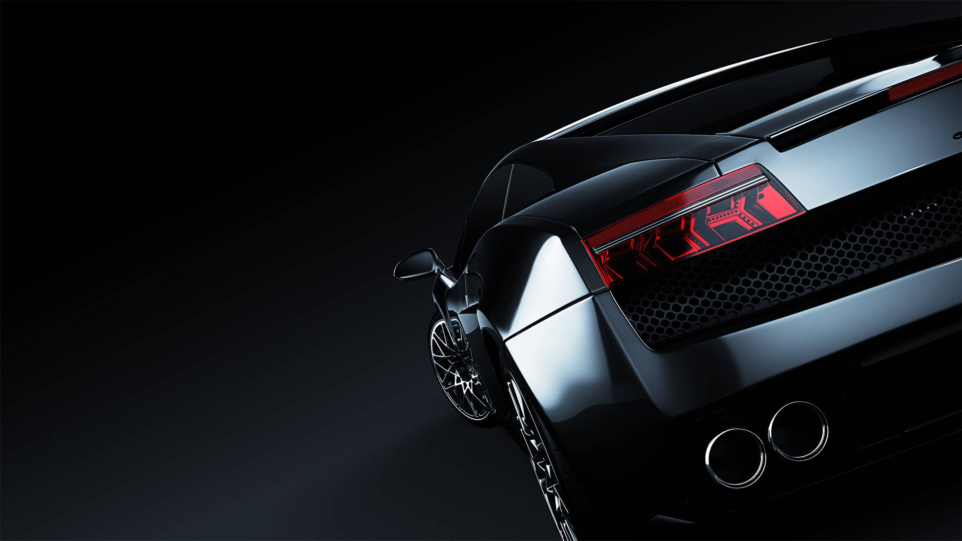Lamborghini 4K 桌布 壁紙 — 一輛時尚黑色跑車的尾部在黑暗的攝影棚背景下發出紅色尾燈的光芒。