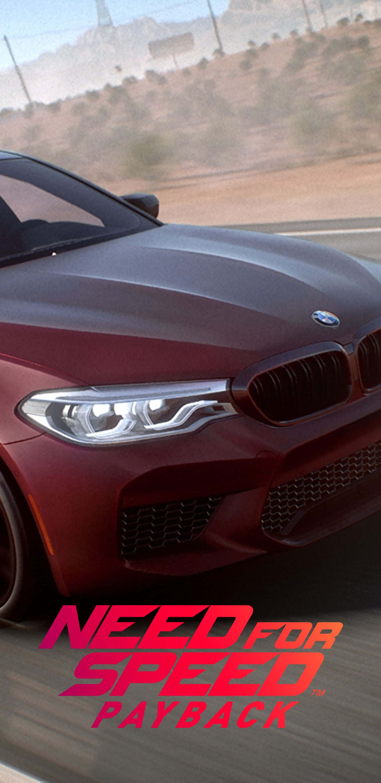 Pixel 3xl Need For Speed Payback 桌布 壁紙 — 一輛栗色BMW M5在沙漠公路上高速行駛，周圍環境模糊，前景有『Need for Speed Payback』標誌。