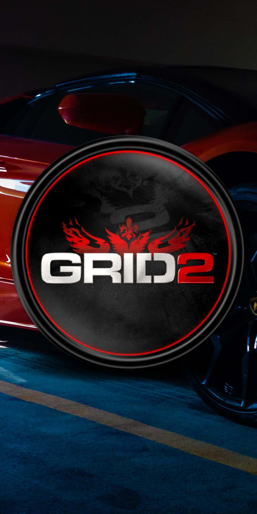 電玩遊戲 桌布 壁紙 — 一輛流線型紅色跑車部分可見於發光的圓形GRID 2標誌後方，帶有火焰翅膀。