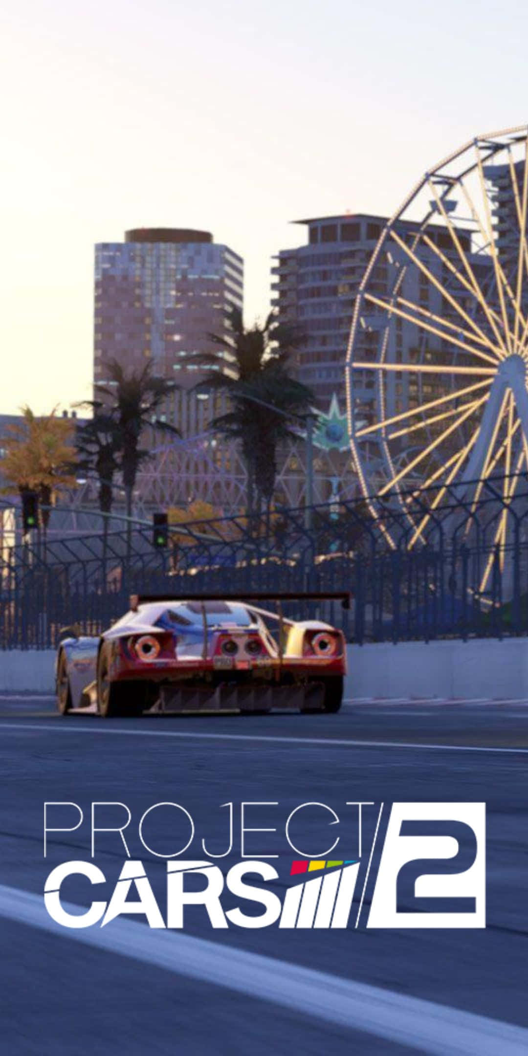 Pixel 3 Project Cars 2 桌布 壁紙 — 一輛流線型賽車在日落時分沿著城市賽道飛馳，背景是閃爍的摩天輪和摩天大樓。