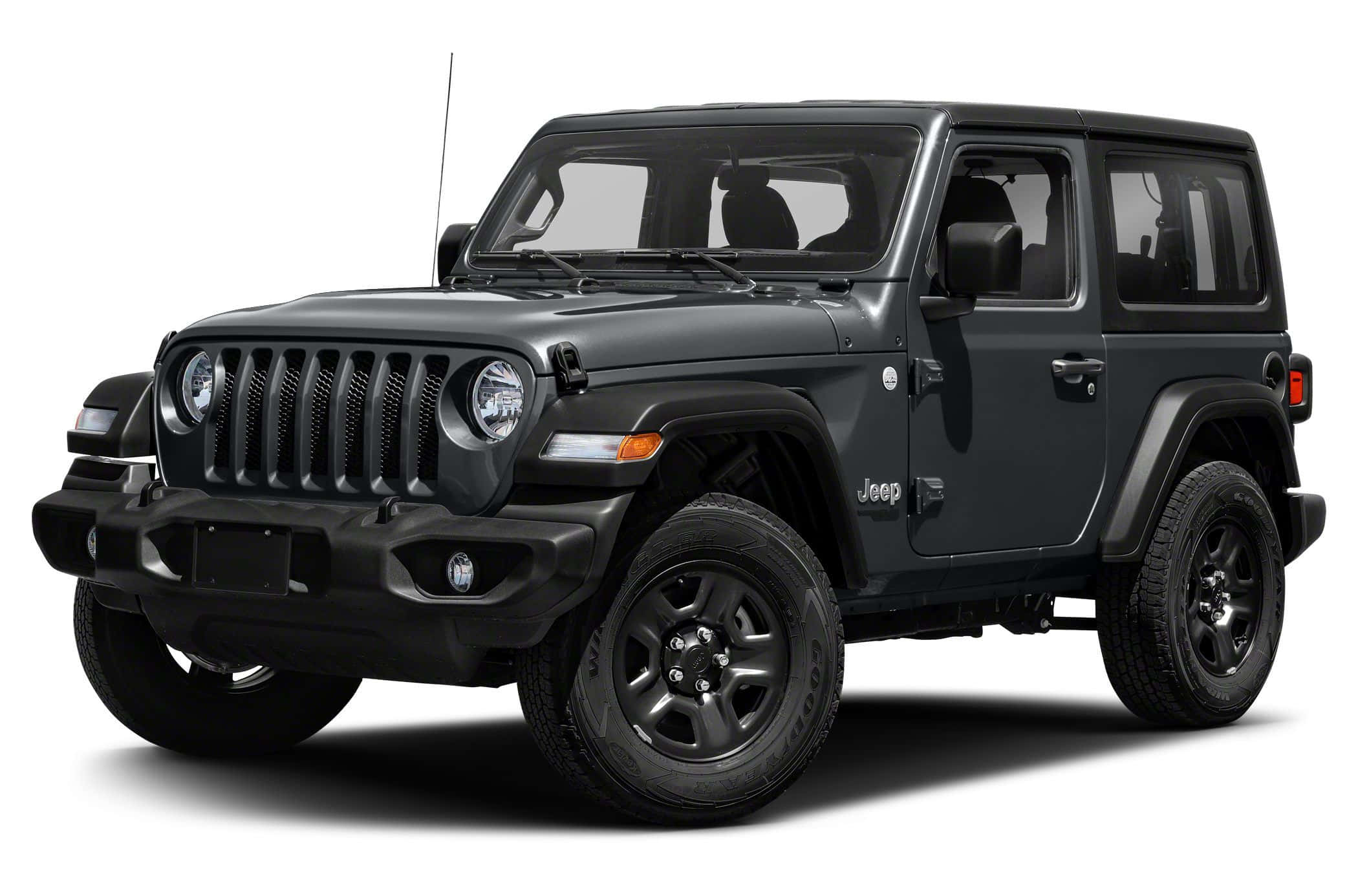 吉普 桌布 壁紙 — 一輛消光黑色Jeep Wrangler在純白背景前大膽展示其堅固設計和標誌性七槽格柵。