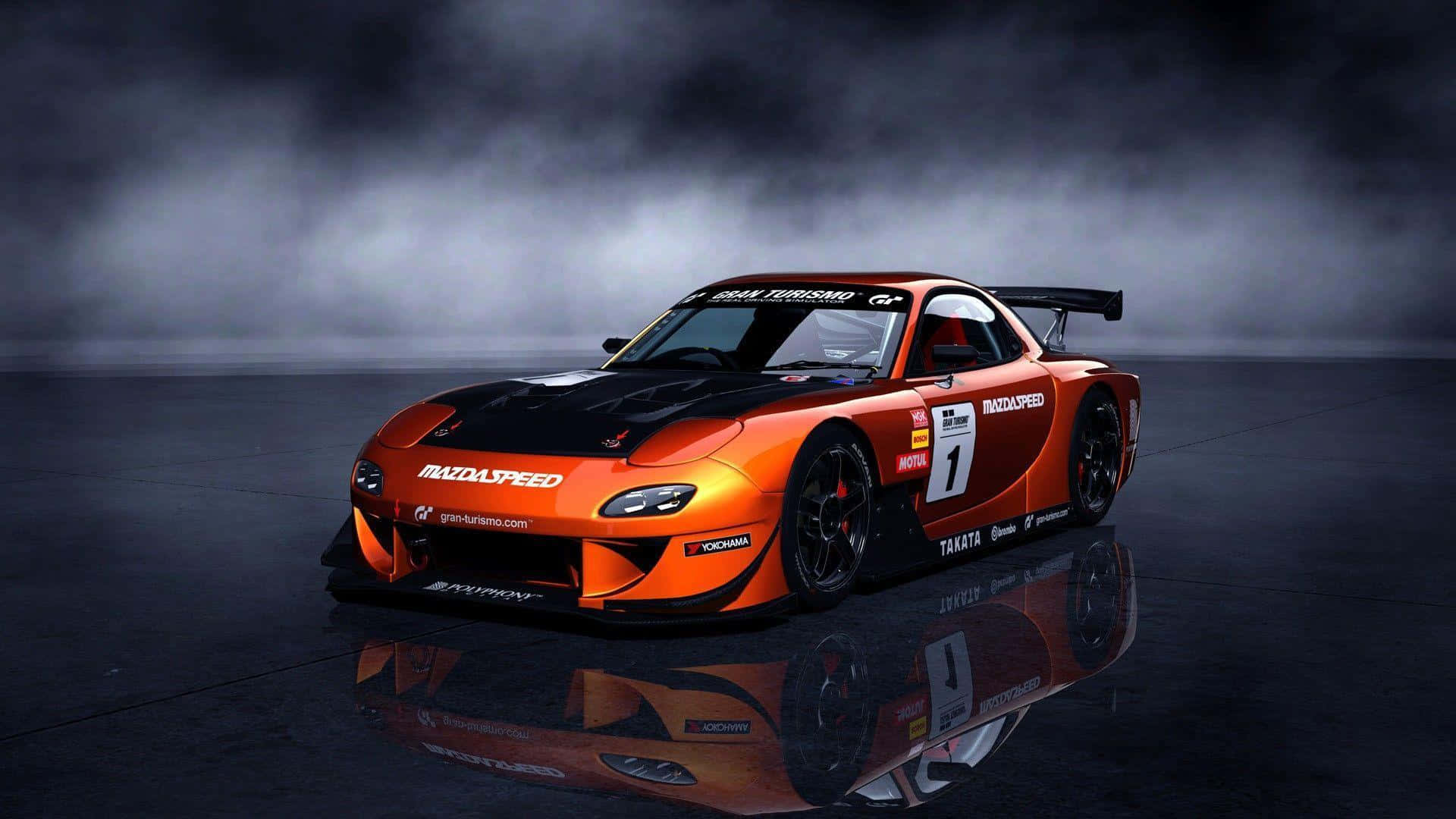 Mazda 桌布 壁紙 — 一輛火橙色和黑色的馬自達賽車，帶有數字一，在戲劇性的煙霧瀰漫燈光下，停在反光的濕滑路面上。