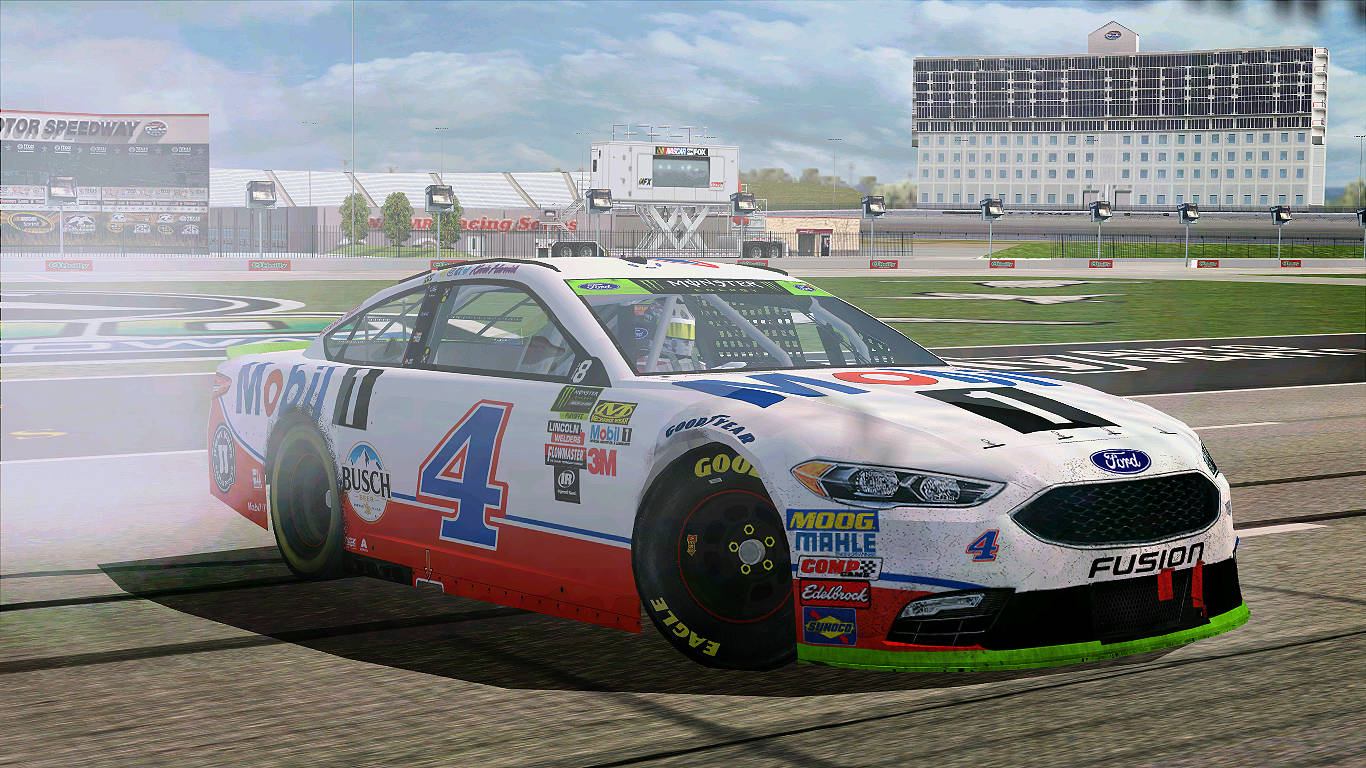 Kevin Harvick 桌布 壁紙 — 一輛白色、紅色和藍色的 #4 Ford Fusion NASCAR 賽車在賽道上飄移，輪胎冒出煙霧。