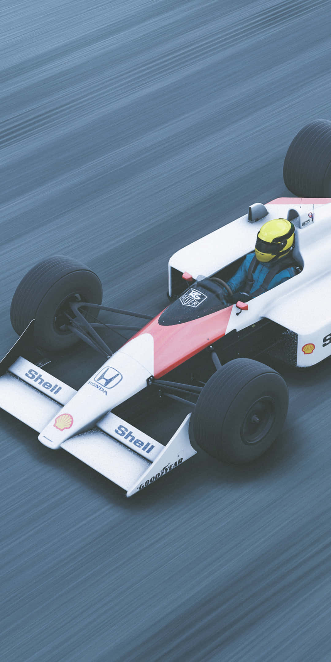 F1 桌布 壁紙 — 一輛白色、紅色和黑色的一級方程式賽車，車手戴著黃色頭盔，在模糊的藍色賽道上奔馳。