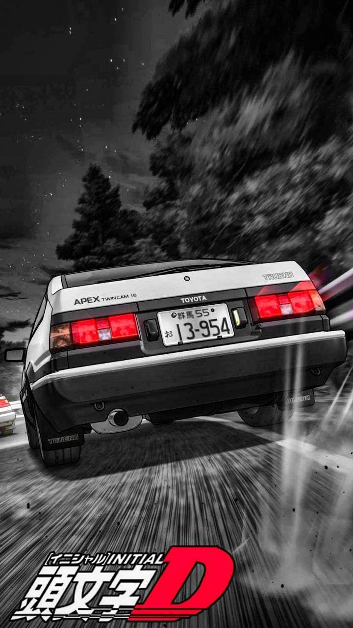 頭文字D 桌布 壁紙 — 一輛白色豐田AE86在夜間甩尾，紅色尾燈在星空和模糊的樹木背景下發光。