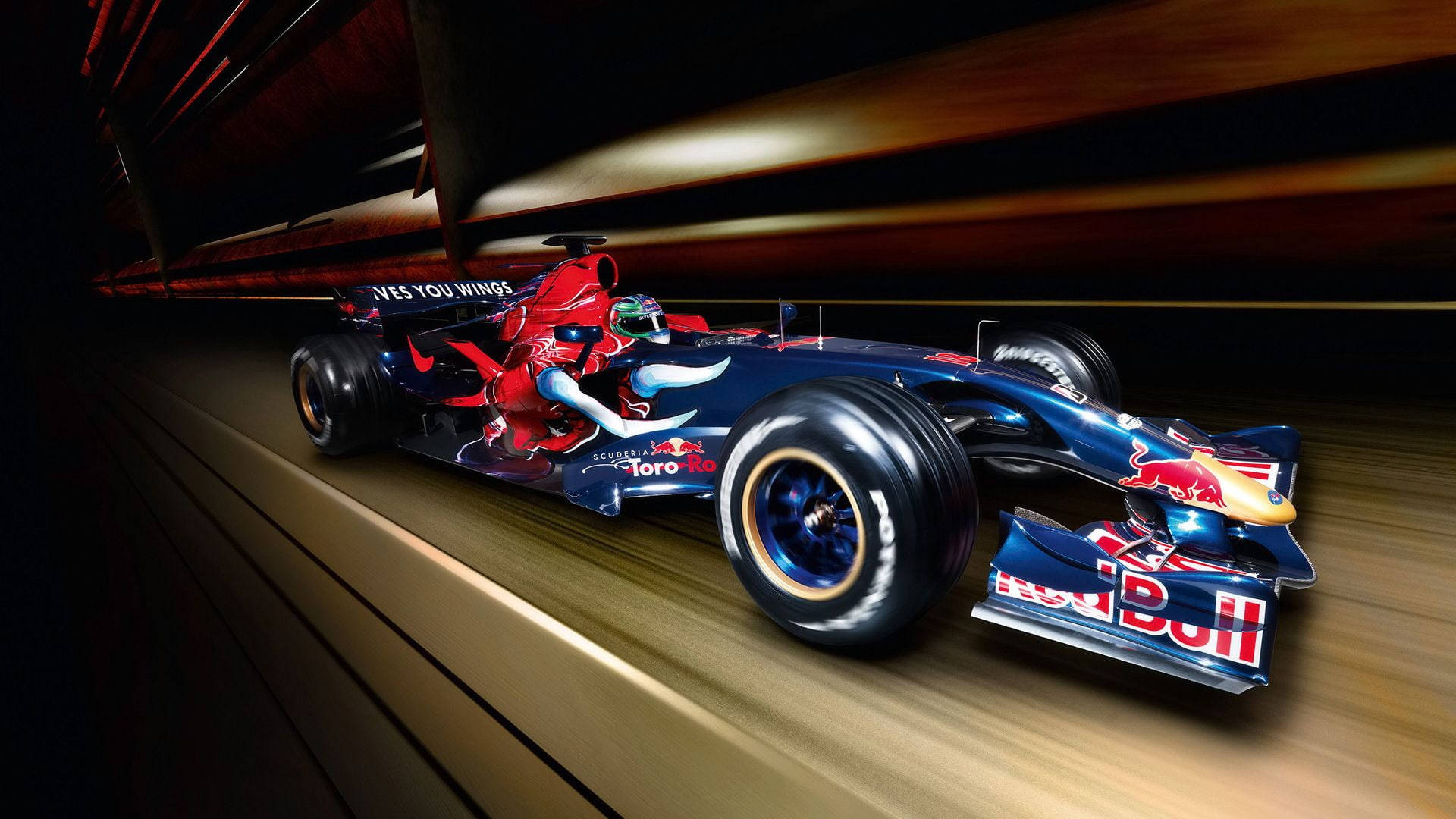 F1 桌布 壁紙 — 一輛紅牛一級方程式賽車高速穿越隧道，動態模糊強調高速和流線型空氣動力學設計。