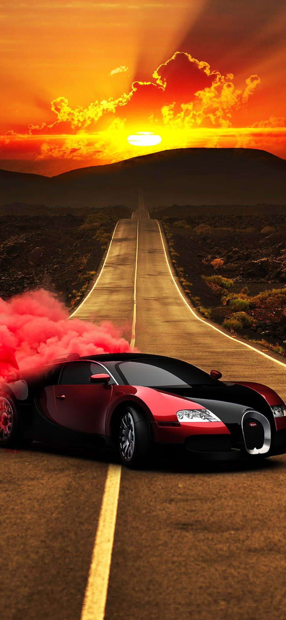 iPhone Xs Bugatti 桌布 壁紙 — 一輛紅色Bugatti跑車在熾熱的日落天空下的沙漠公路上噴出粉紅色煙霧。