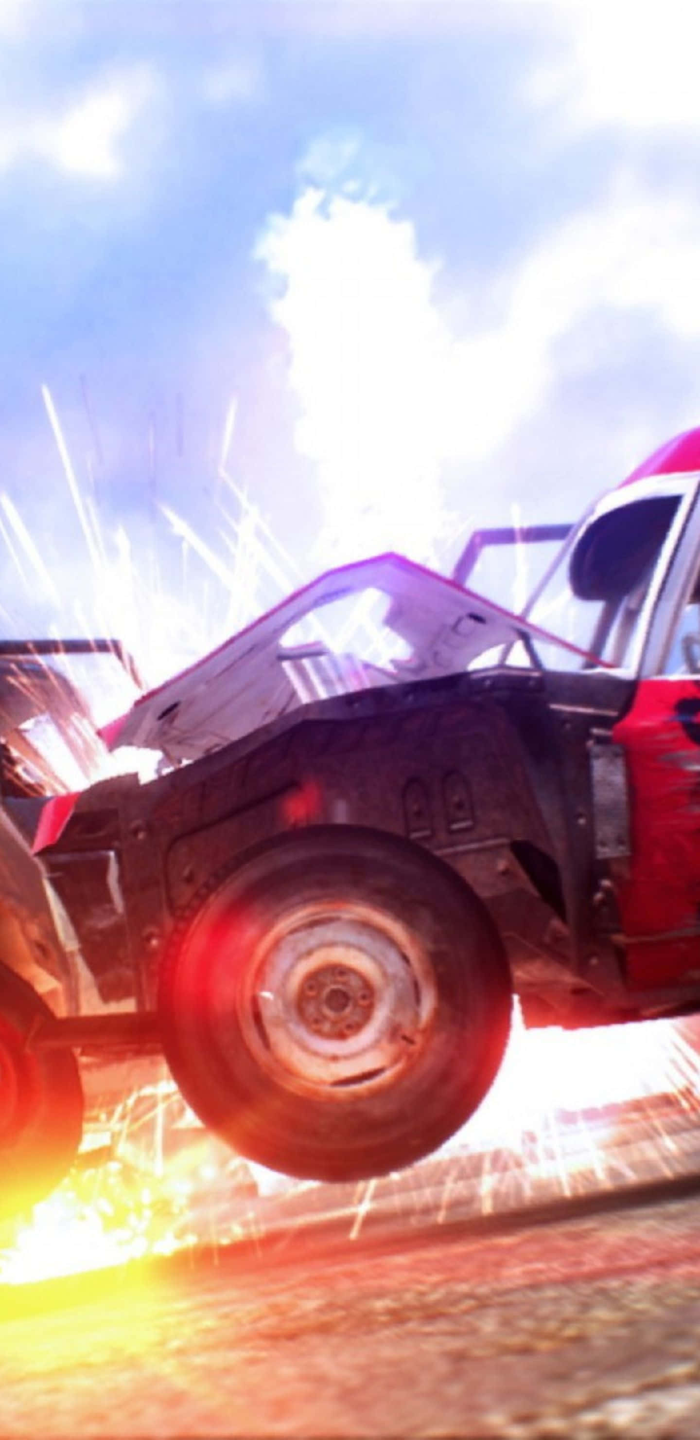 Red Car 桌布 壁紙 — 一輛紅色損毀的汽車在空中飛馳，火花四濺，映襯著明亮的藍天。