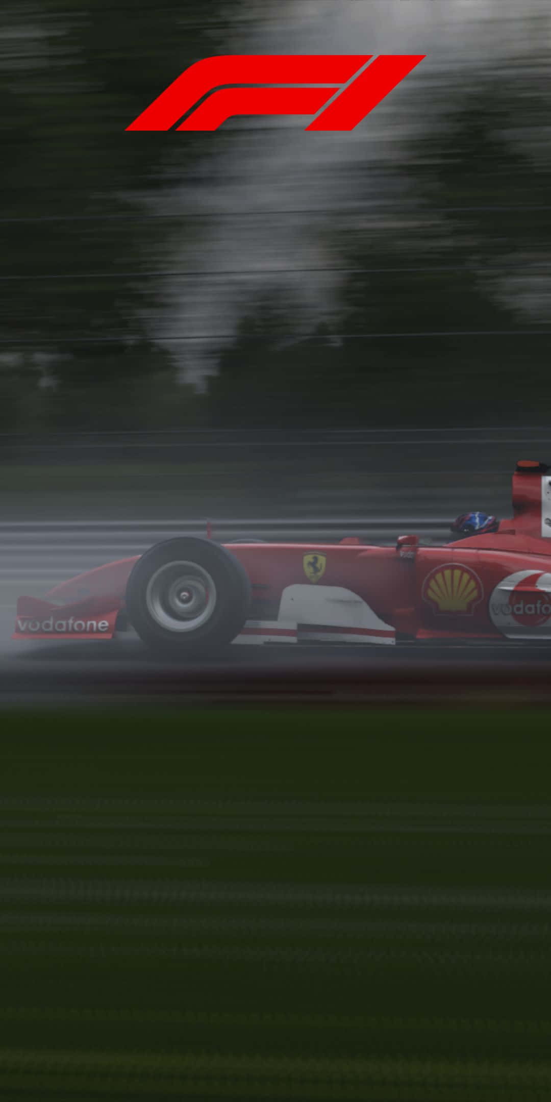 F1 桌布 壁紙 — 一輛紅色法拉利F1賽車在潮濕的賽道上以動態模糊效果疾馳而過，天空多雲。