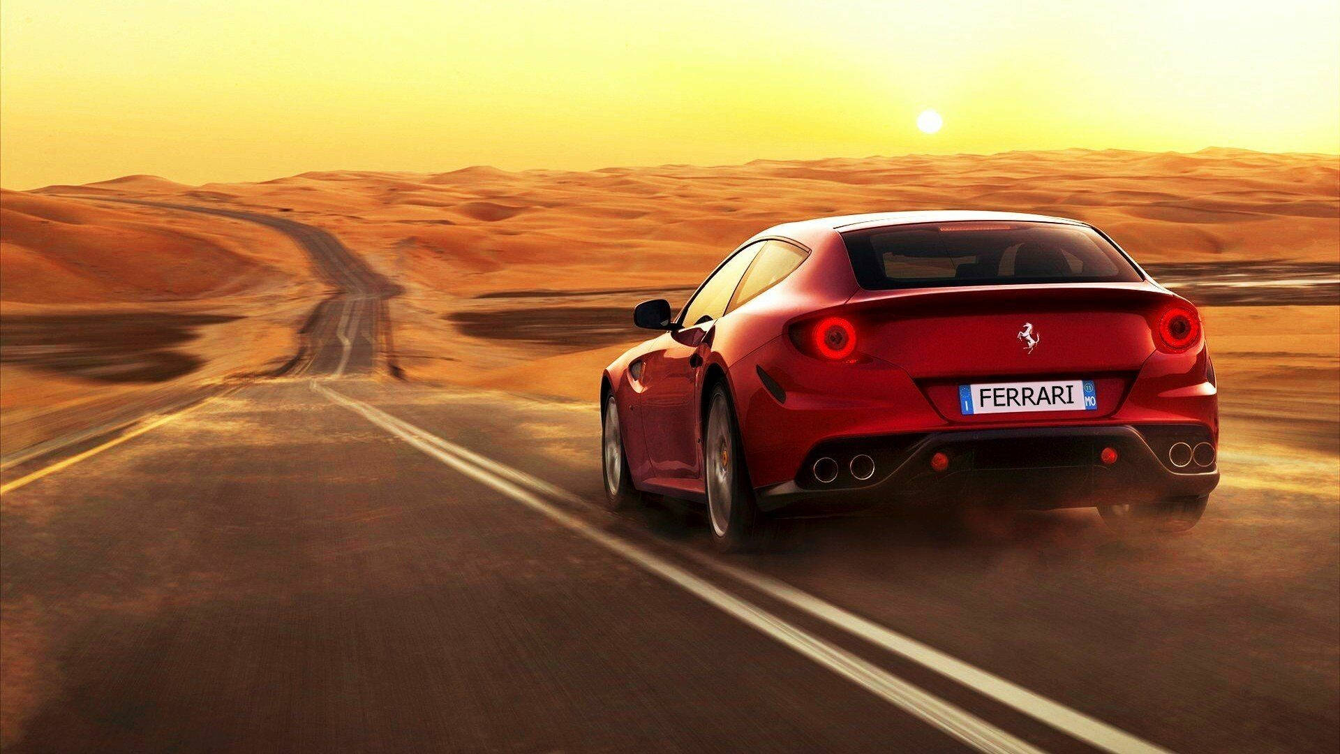 1920x1080 Ferrari 桌布 壁紙 — 一輛紅色法拉利在日落時分沿沙漠公路飛馳，在金色沙丘上投下長長的影子。