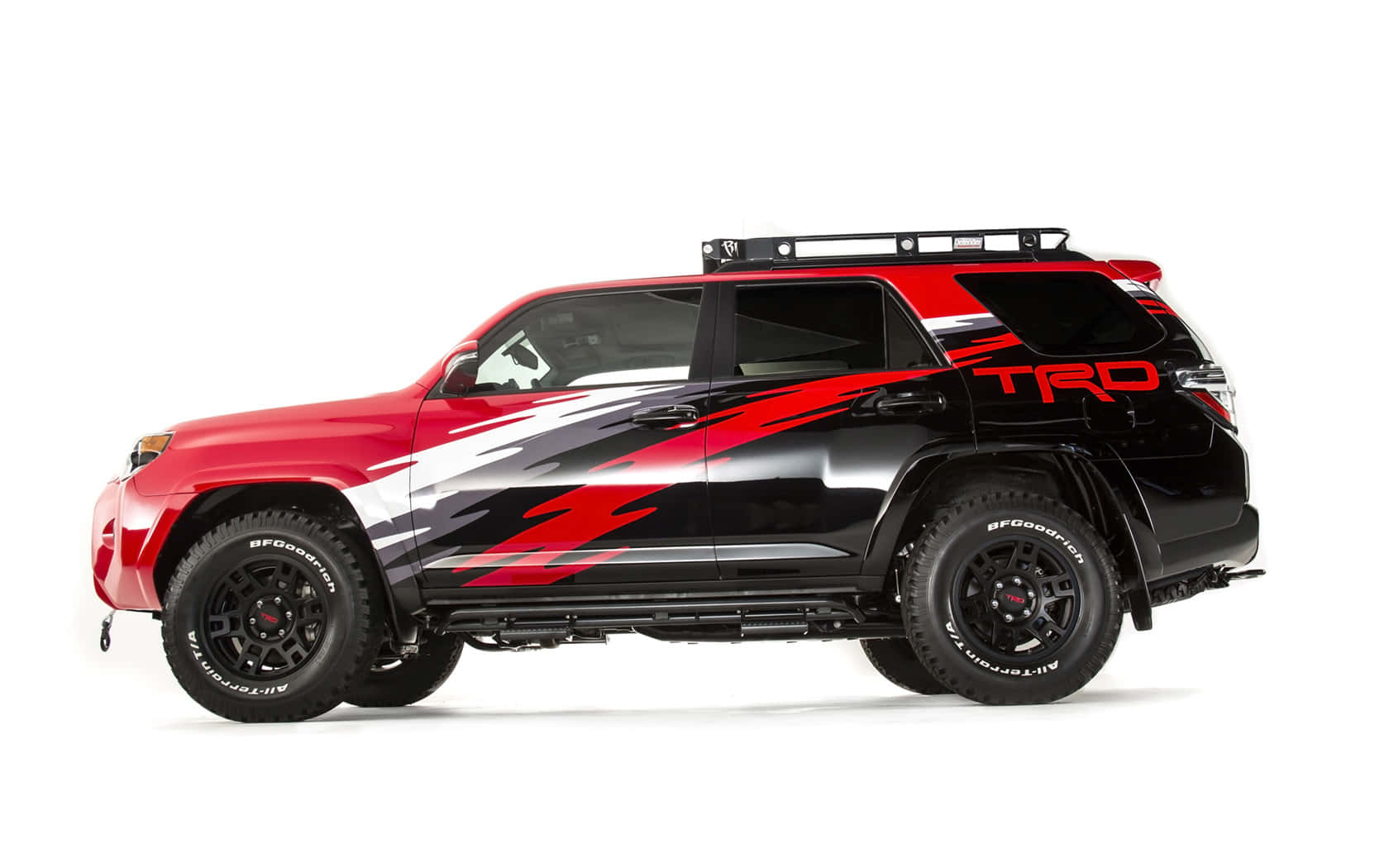 訂製紅黑豐田 4Runner TRD，配備賽車條紋和越野輪胎。 — Toyota Supra Mk4 壁紙