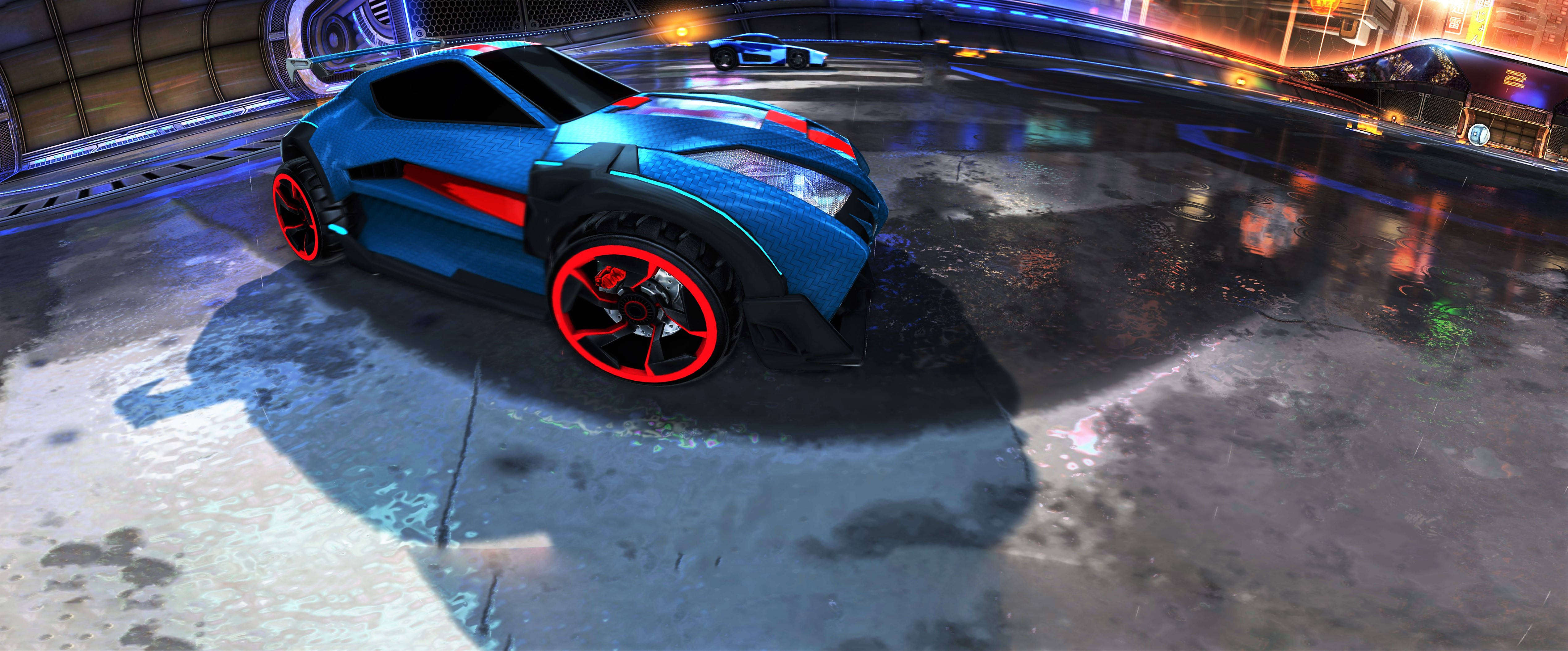 Rocket League 桌布 壁紙 — 一輛藍色和紅色的未來主義賽車，帶有發光車輪，停在城市燈光下濕漉漉的霓虹燈賽道上。