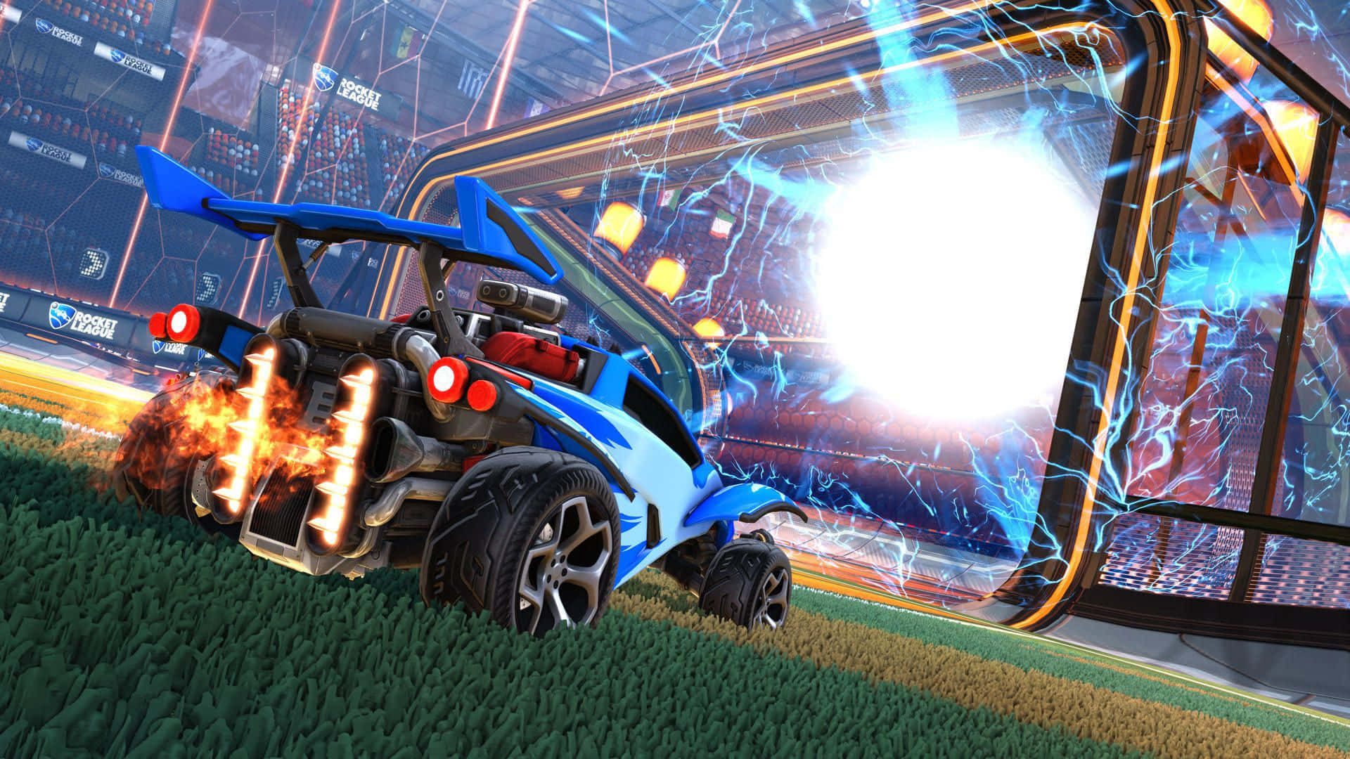 HD Rocket League 桌布 壁紙 — 一輛藍色火箭動力賽車，排氣管噴出火焰，從霓虹燈照亮的未來主義體育館的草地賽道上起飛。