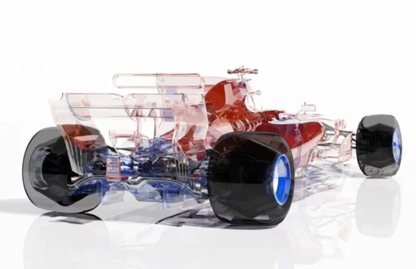 F1 桌布 壁紙 — 一輛透明紅藍色一級方程式賽車，內部機械結構清晰可見，置於反光白色表面上。