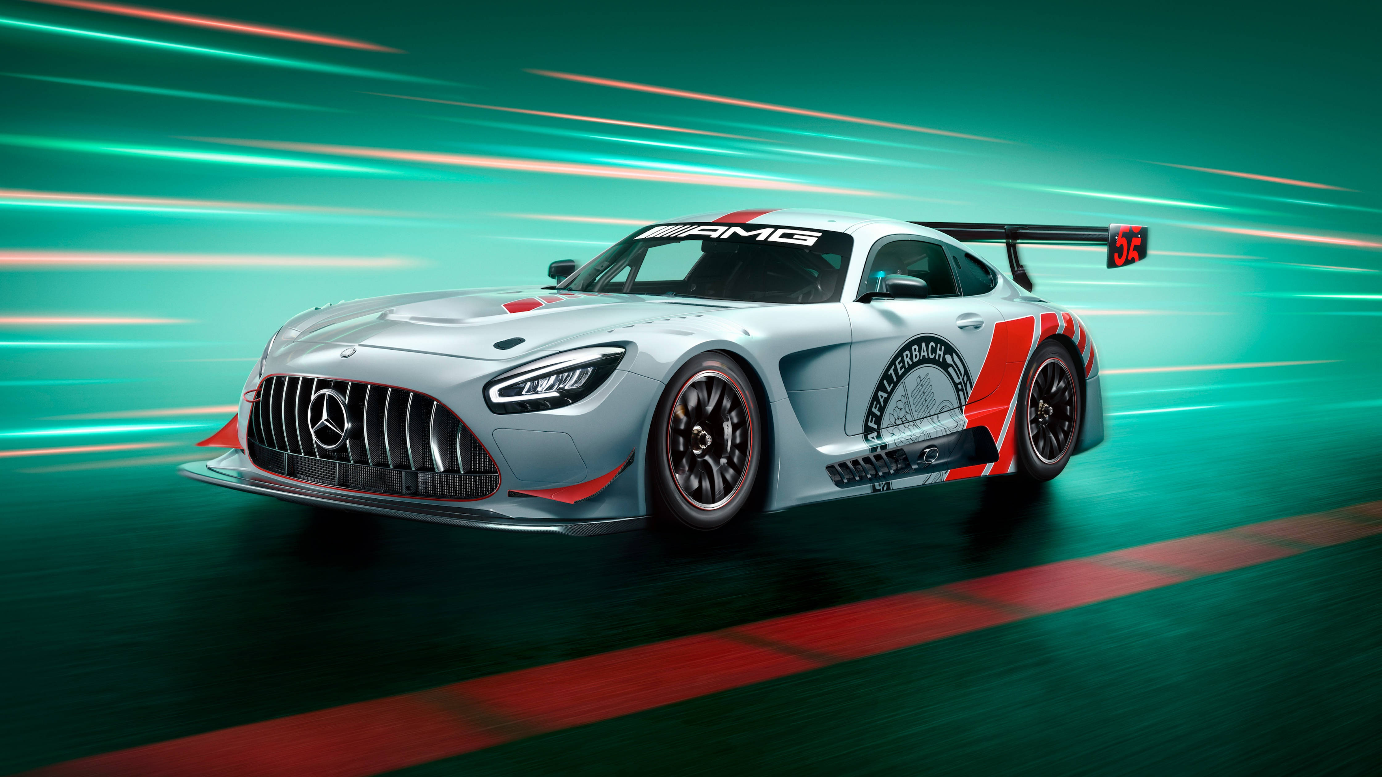Mercedes 桌布 壁紙 — 一輛銀色 Mercedes-AMG GT3 賽車在賽道上疾馳，帶有青綠色的動態模糊條紋和紅色賽道線。