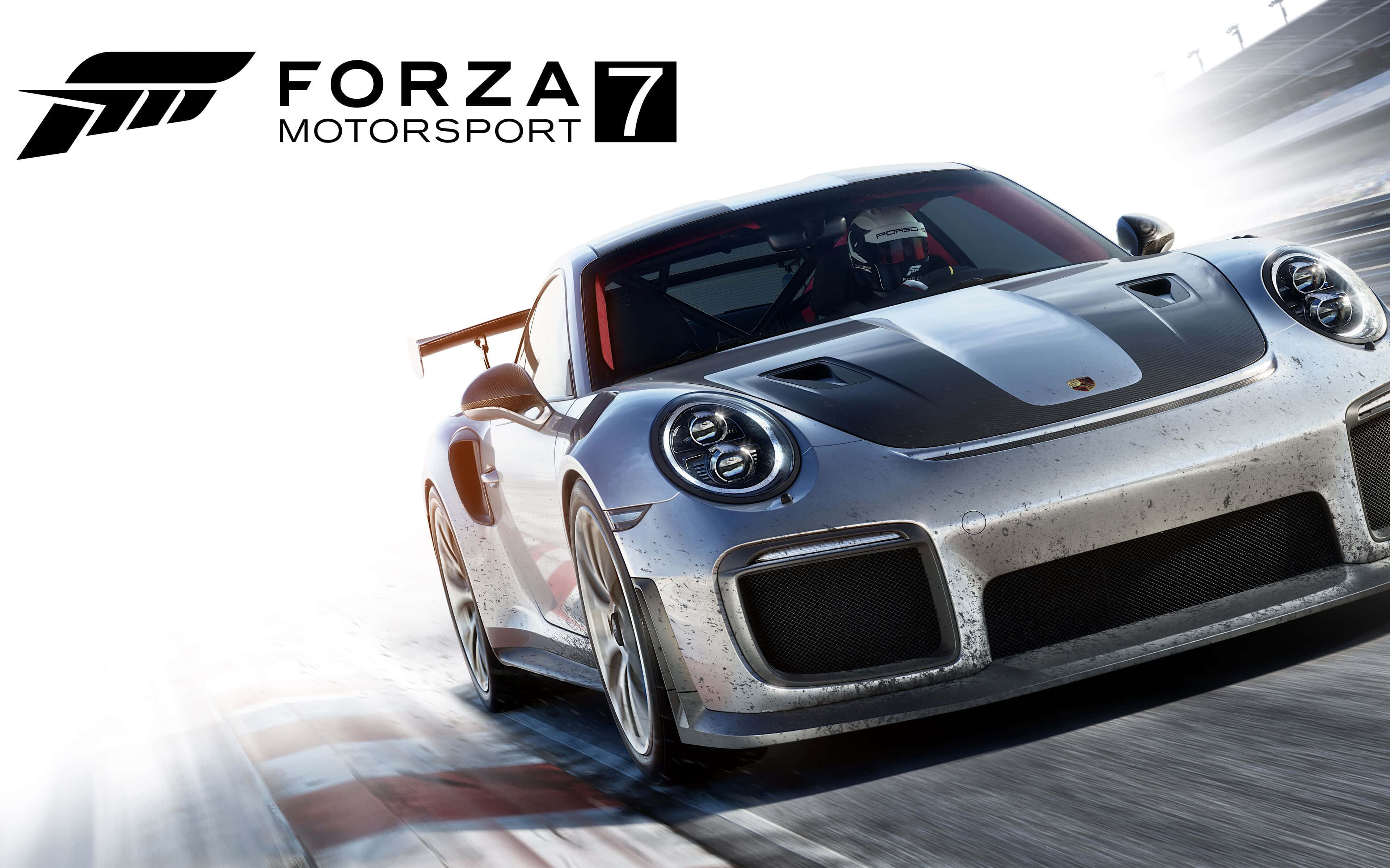 跑車 桌布 壁紙 — 一輛銀色保時捷 911 GT2 RS 在賽道上奔馳，帶有動態模糊和明亮的陽光。