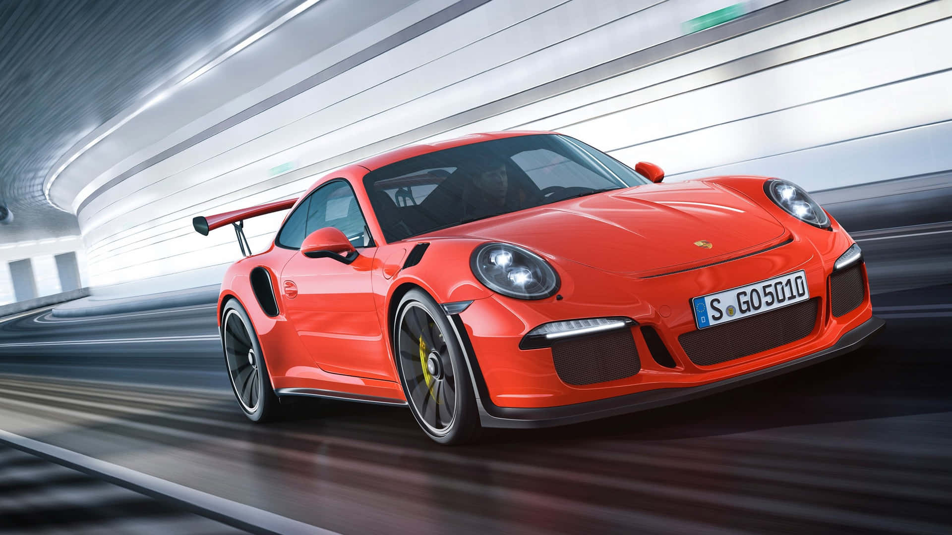 紅色保時捷911 GT2 RS在彎曲隧道中疾馳，呈現模糊動態。 — 保時捷 GIF 壁紙