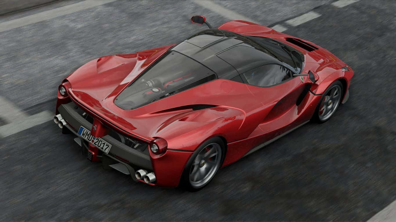 Red Car 桌布 壁紙 — 一輛鮮紅色的法拉利 LaFerrari 在灰色瀝青路上高速行駛，動態模糊效果突顯其高性能。