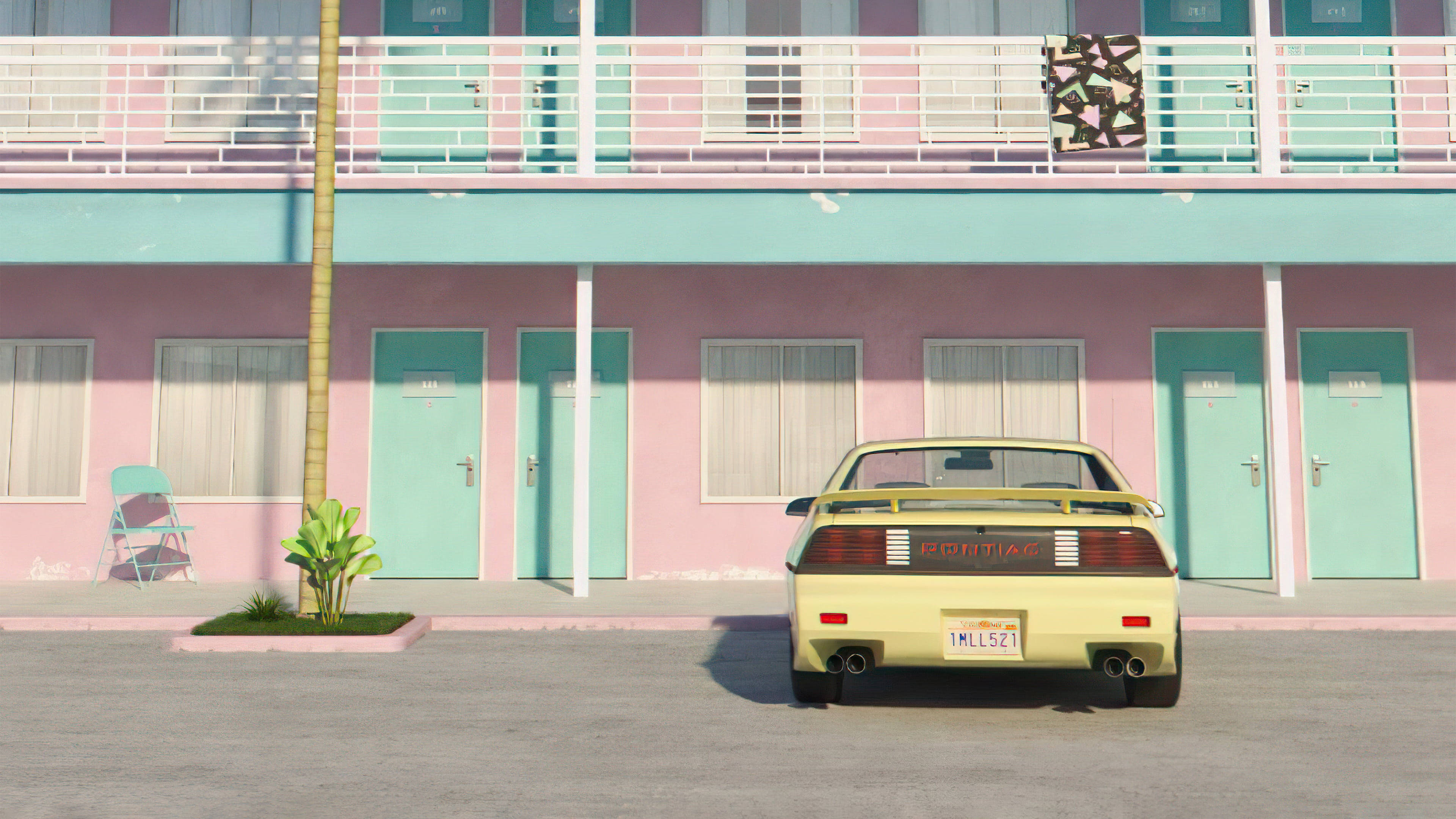 Retro Aesthetic 桌布 壁紙 — 一輛黃色Pontiac Fiero停在一間粉彩粉紅和青綠色汽車旅館前，在明亮的日光下。