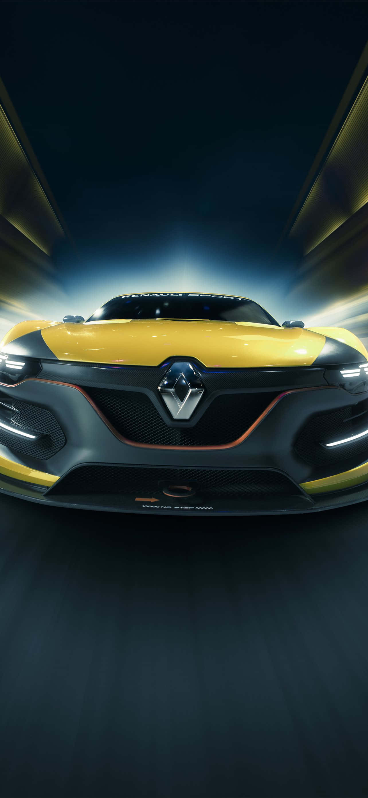 Renault Scenic 桌布 壁紙 — 一輛黃色雷諾跑車在黑暗隧道背景下，閃爍著車頭燈和動態模糊痕跡向前飛馳。
