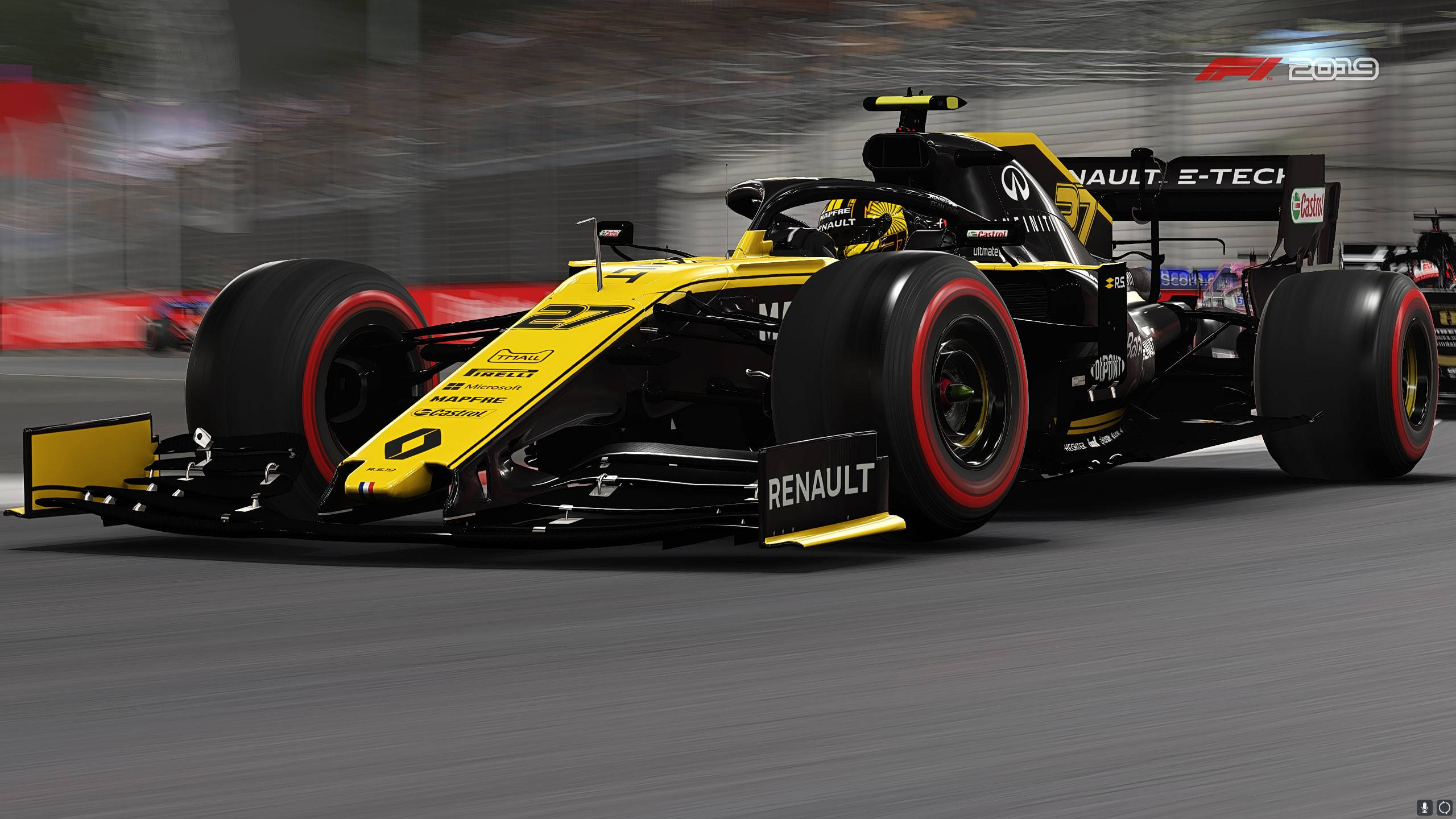 F1 2019 壁紙 桌布 壁紙 — 一輛黃黑相間的雷諾一級方程式賽車在賽道上疾馳，背景呈現動態模糊效果。