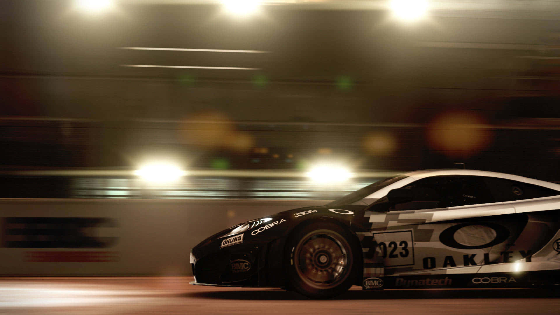 Grid Autosport 桌布 壁紙 — 一輛黑白賽車在隧道中疾馳，模糊的燈光以動態模糊效果掠過。