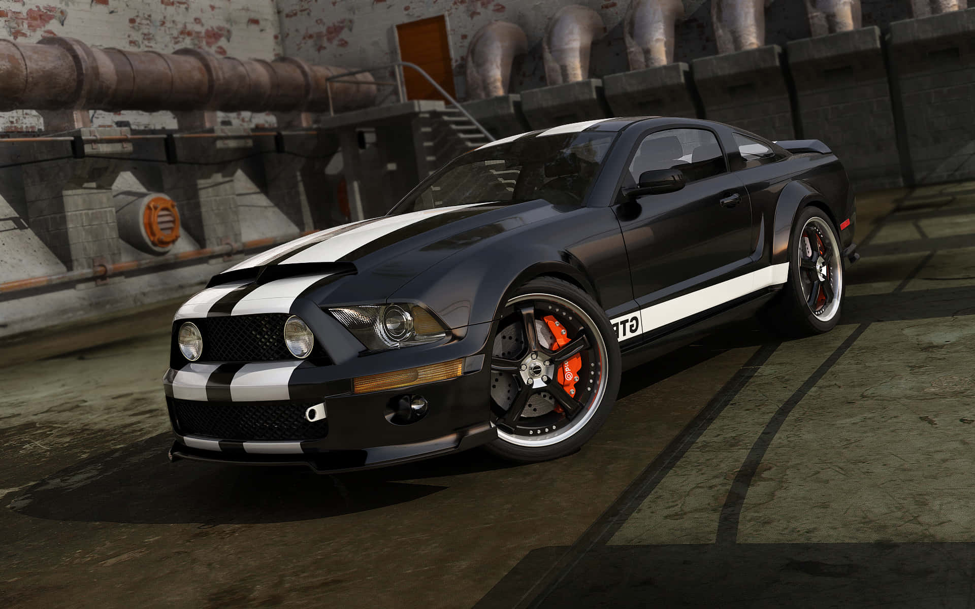 福特 桌布 壁紙 — 一輛黑色Shelby GT500，帶有白色賽車條紋和橙色制動卡鉗，停在工業倉庫環境中。