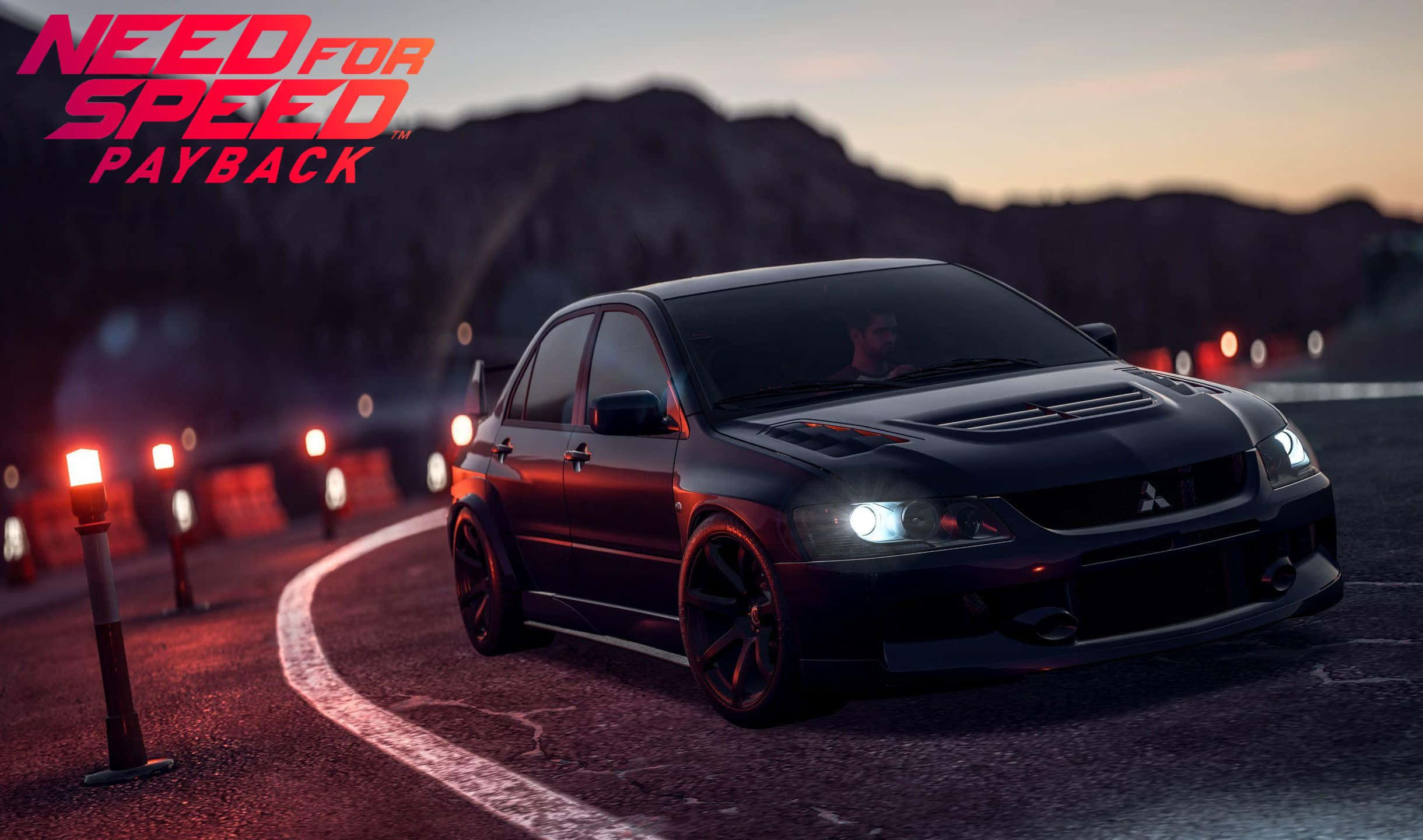 2440x1440 Need For Speed Payback 桌布 壁紙 — 一輛黑色三菱Lancer Evolution在黃昏時分在蜿蜒的賽道上奔馳，賽道上有發光的紅色護欄和遠處的燈光。