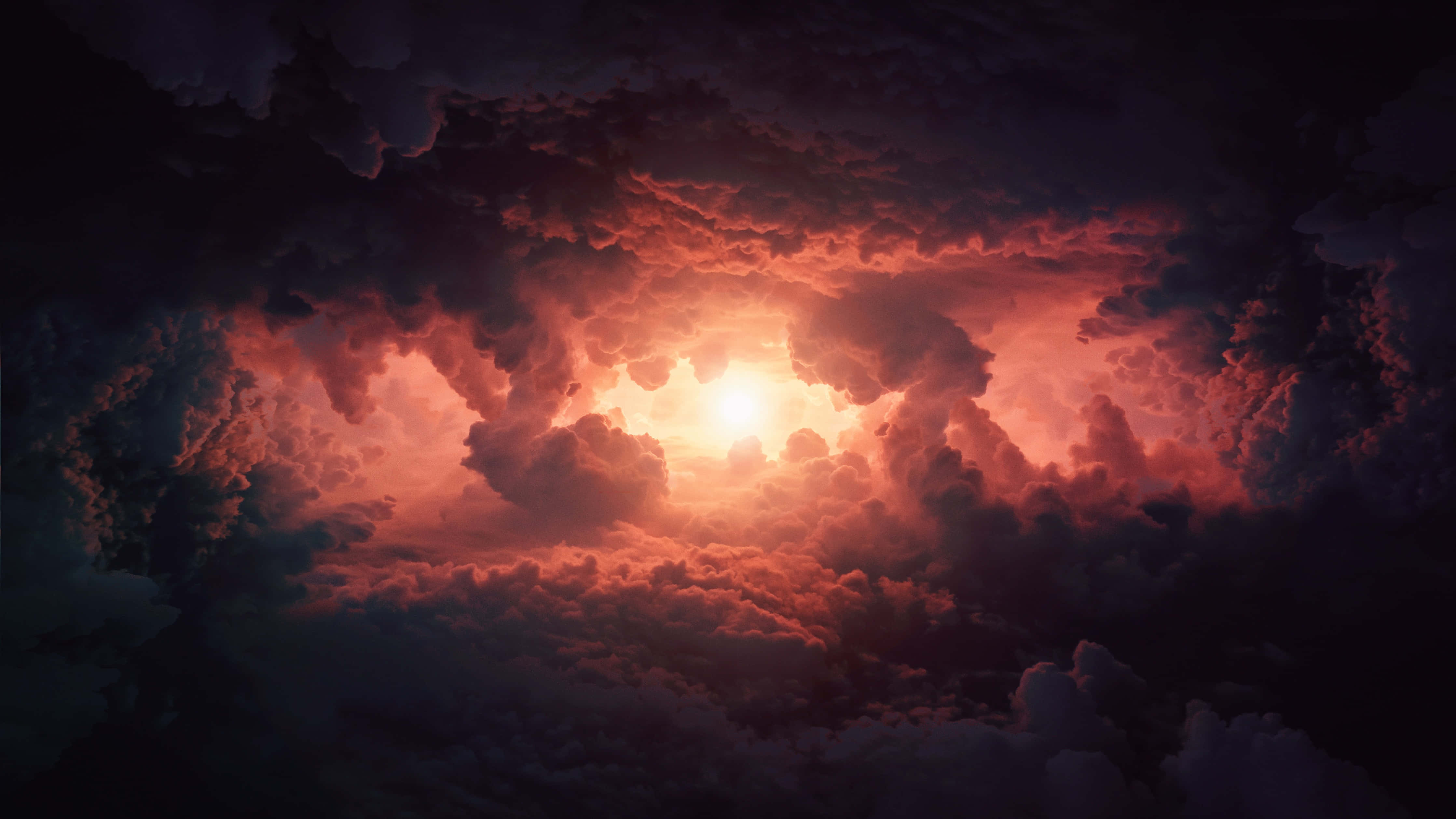 Clouds Aesthetics 桌布 壁紙 — 一輪光芒四射的太陽穿透戲劇性的紅色和紫色暴風雲，呈現出令人嘆為觀止的天體景象。