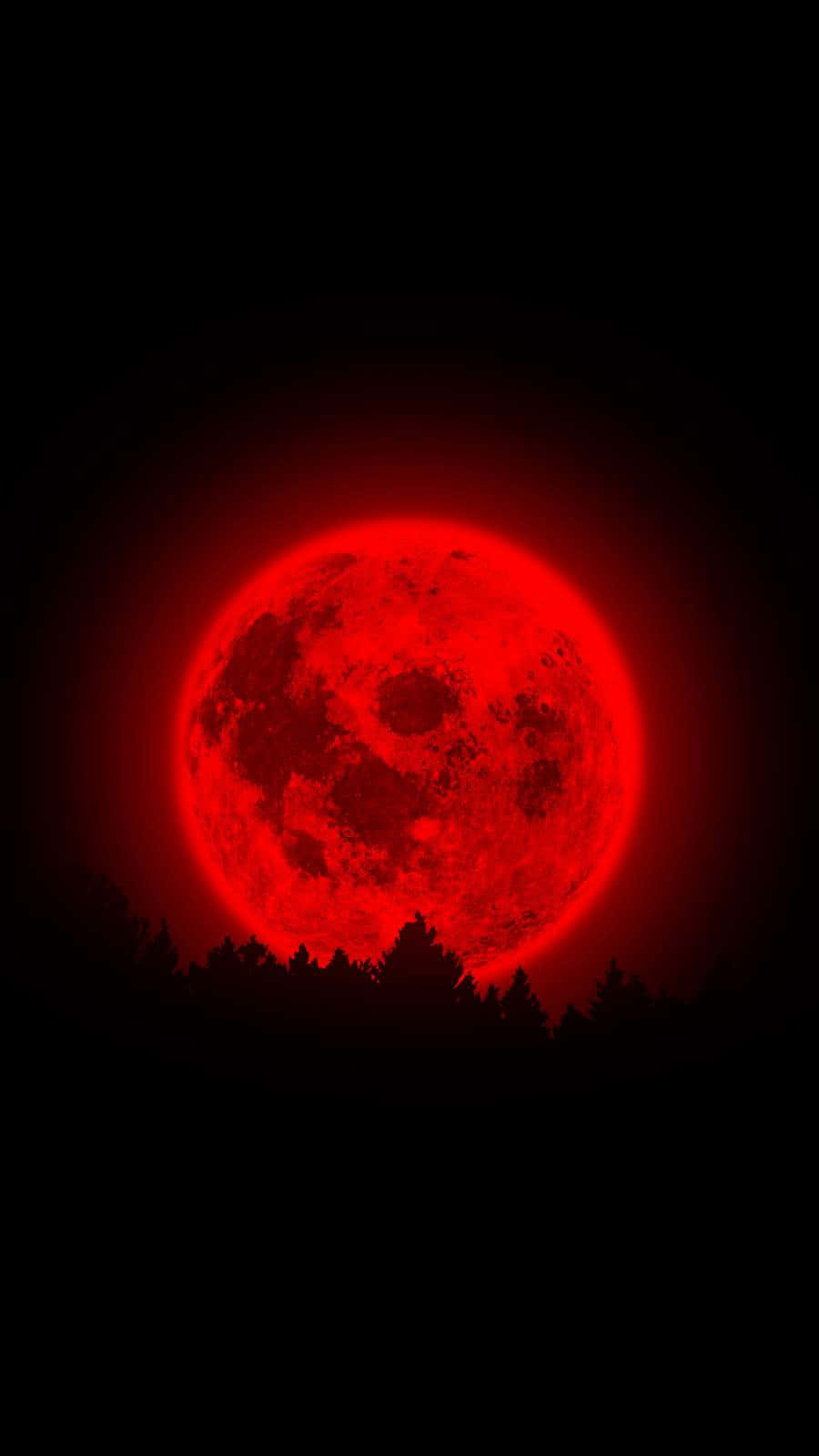 blood moon 桌布 壁紙 — 一輪巨大的發光紅月主宰著漆黑天空，下方是黑暗的樹木剪影。