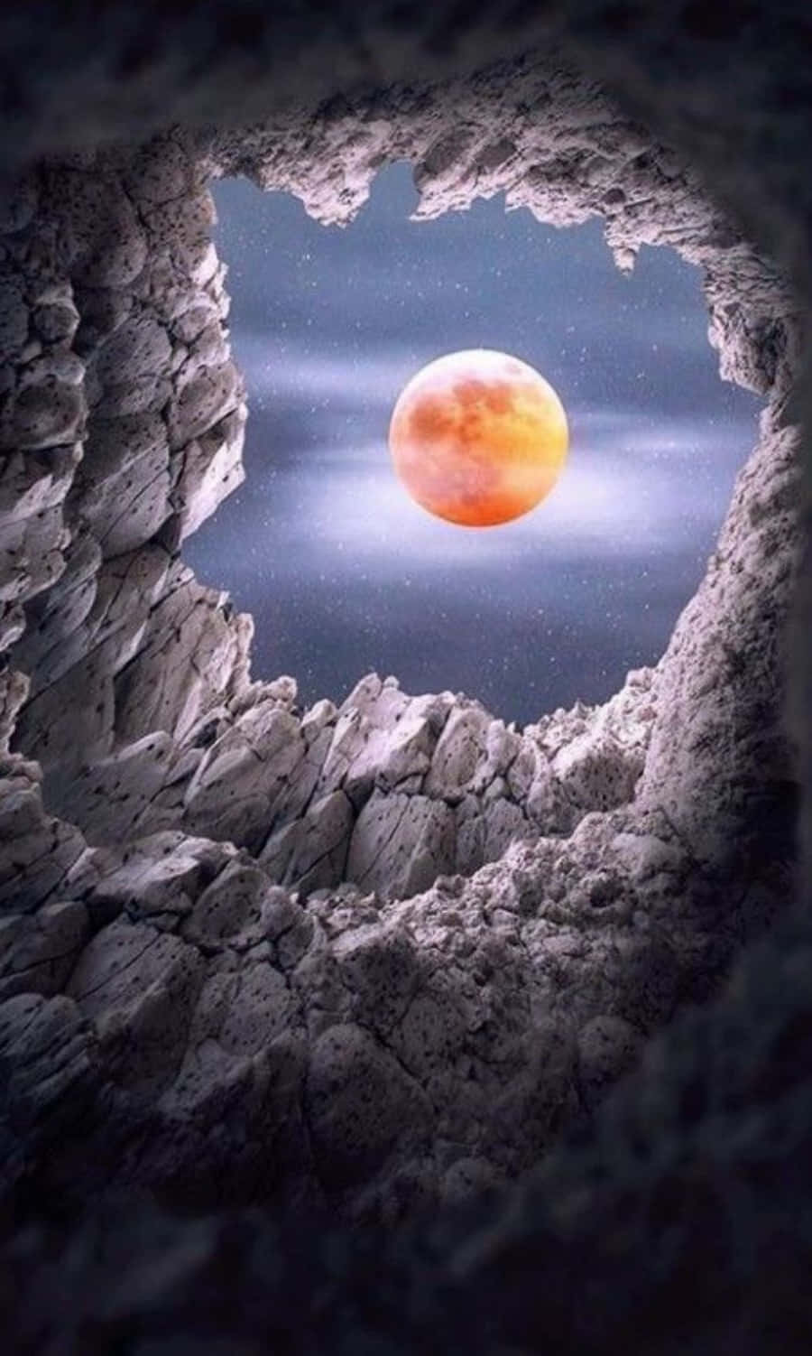 Beautiful Moon 桌布 壁紙 — 一輪發光的橙色月亮從崎嶇的岩石洞中窺視，背景是繁星點點的夜空。