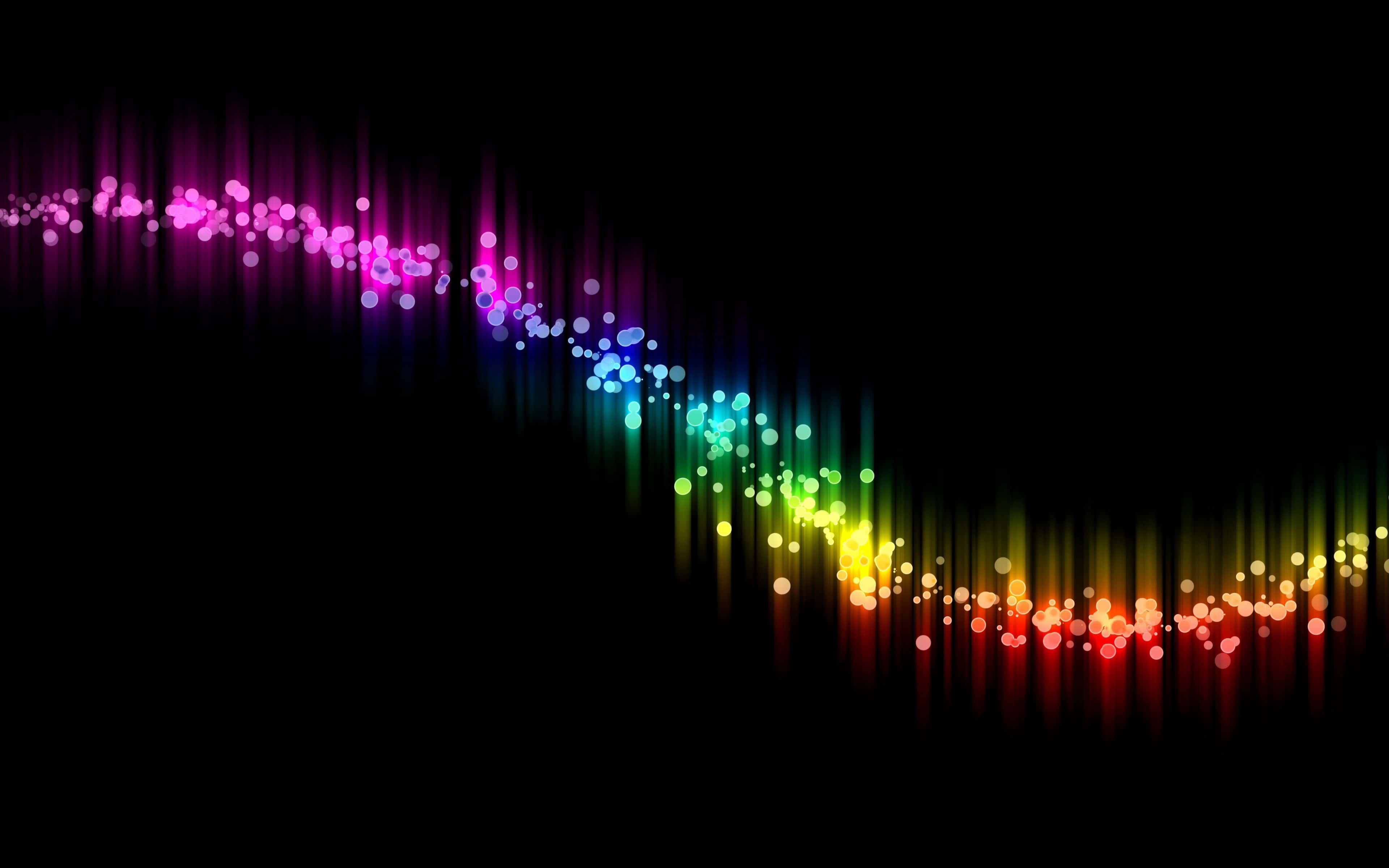 Light Effect 桌布 壁紙 — 一道由發光粒子組成的鮮豔彩虹色光波，像數位極光一樣在黑色背景上劃出弧線。