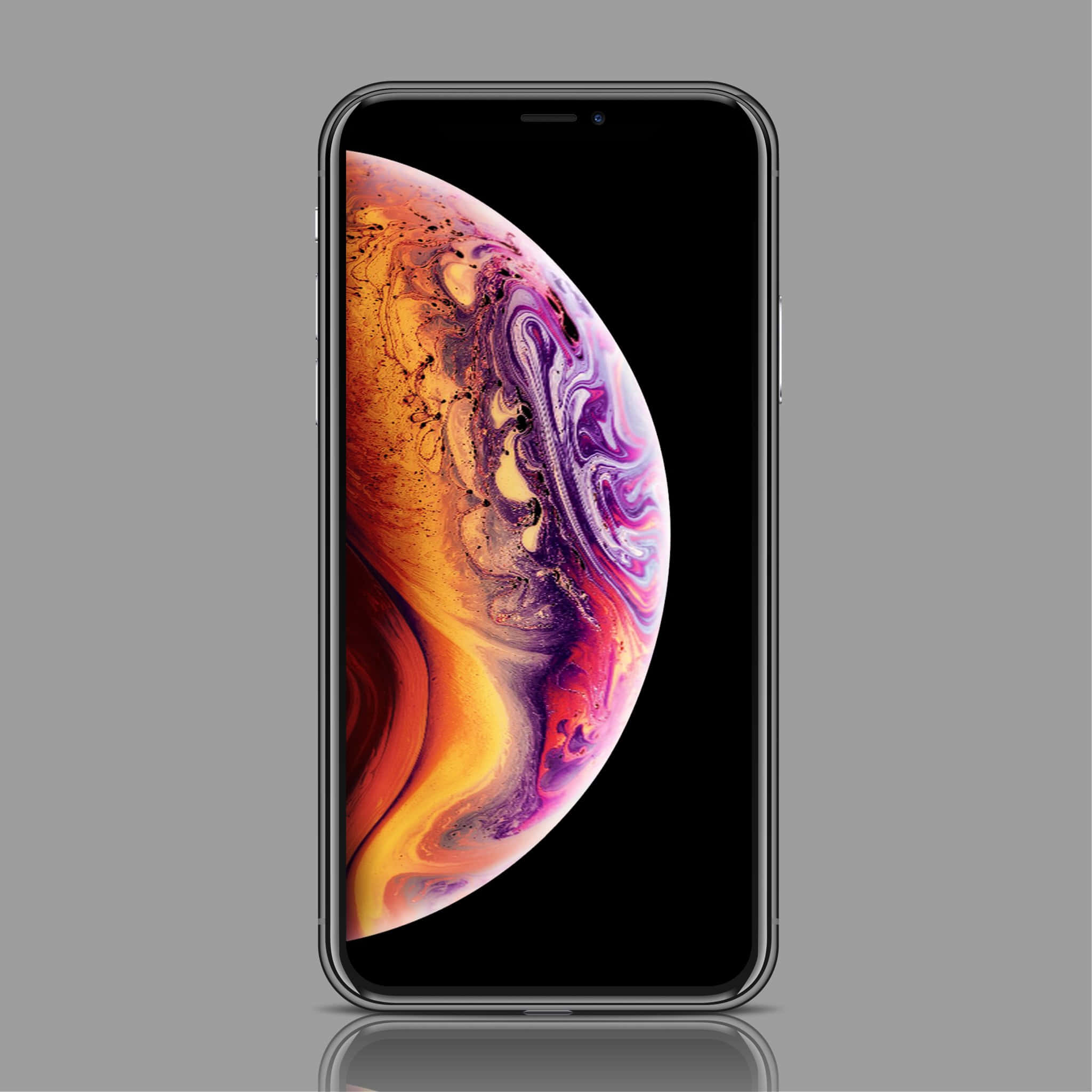 iPhone 美學 桌布 壁紙 — 一部時尚的智慧型手機在灰色中性背景上顯示充滿活力的旋轉星系桌布。