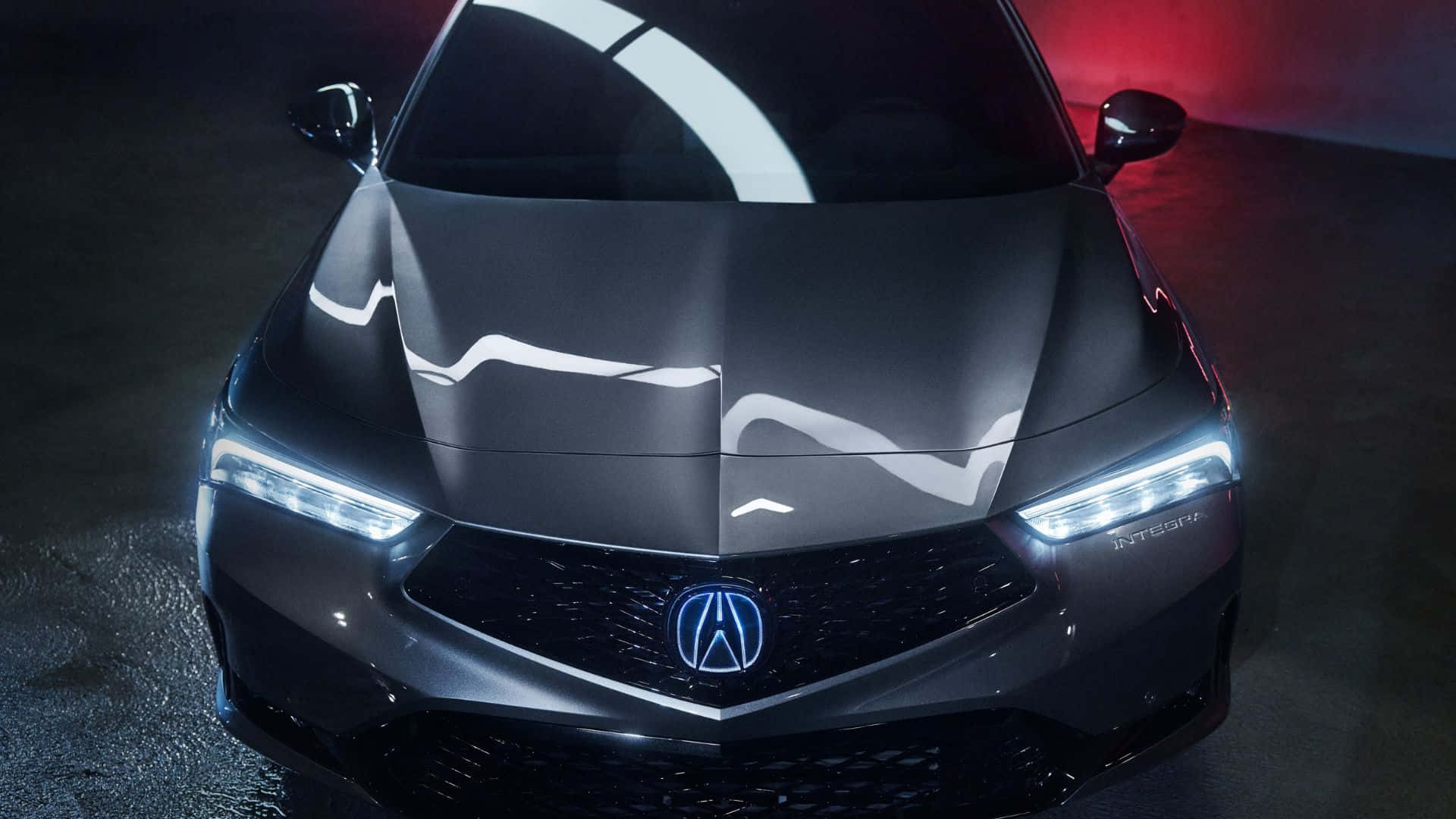 Acura Integra 桌布 壁紙 — 一部時尚的消光黑色Acura Integra跑車在戲劇性的工作室燈光下閃耀，帶有白色和紅色點綴。