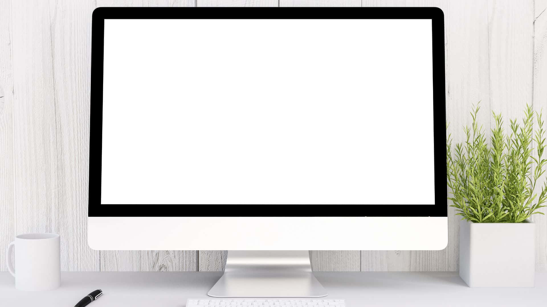 Computer Screen 桌布 壁紙 — 一部時尚的白色一體式桌上型電腦放在簡約的書桌上，旁邊有一盆植物和一個杯子。