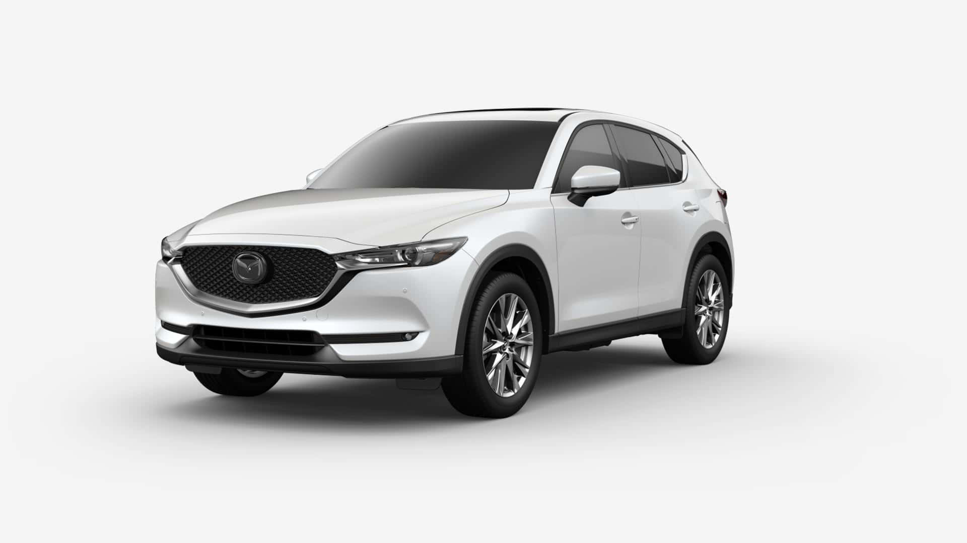 Mazda Cx-30 桌布 壁紙 — 一部時尚的白色馬自達CX-5 SUV在乾淨的攝影棚環境中展示，光線柔和，陰影細膩。