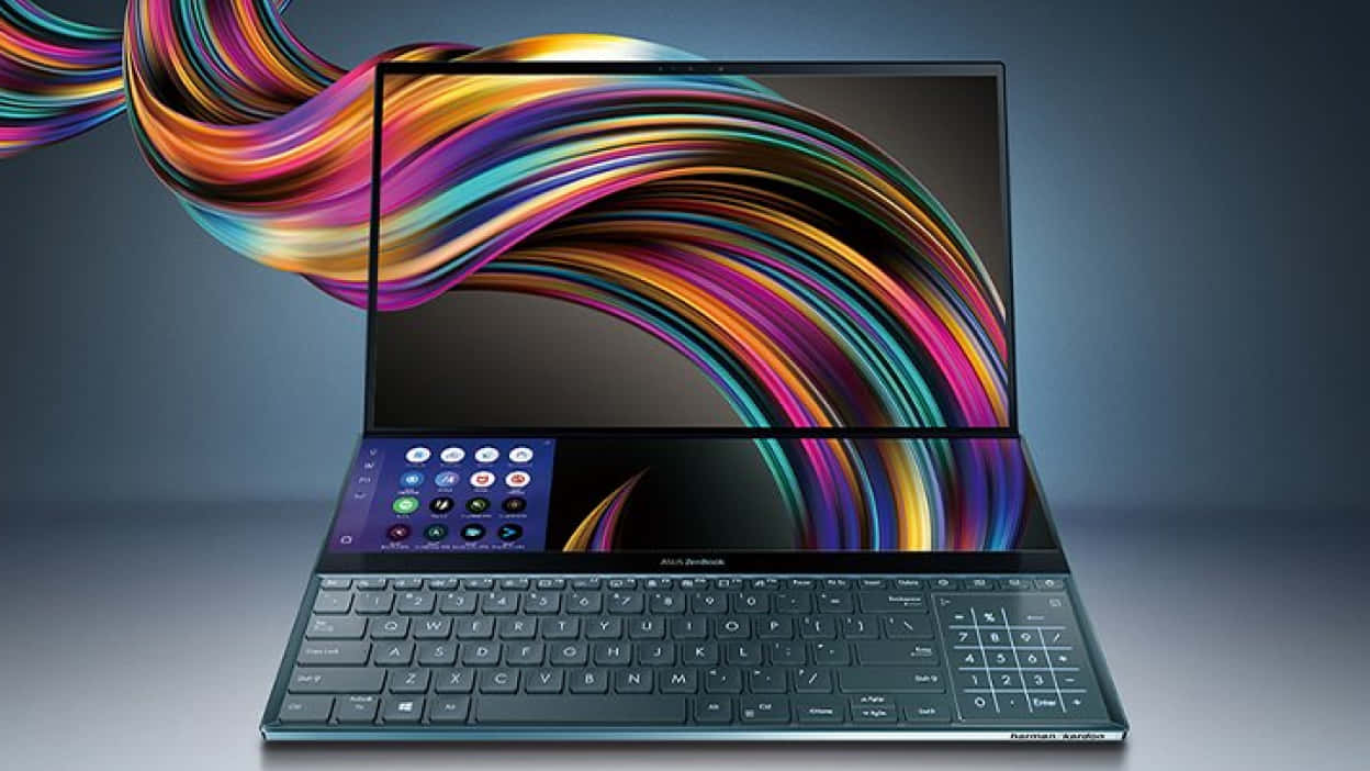 ASUS 桌布 壁紙 — 一部時尚的筆記型電腦在深色漸層背景上顯示從螢幕動態流出的鮮豔旋轉彩虹色。