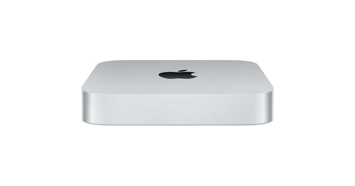 Mac 桌布 壁紙 — 一部時尚的銀色 Apple Mac mini 電腦，黑色標誌位於其簡約頂部表面的中央。