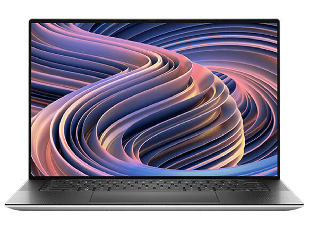 Dell 桌布 壁紙 — 一部時尚的銀色筆記型電腦顯示充滿活力的抽象桌布，帶有紫色、粉紅色和金色的旋轉絲帶。