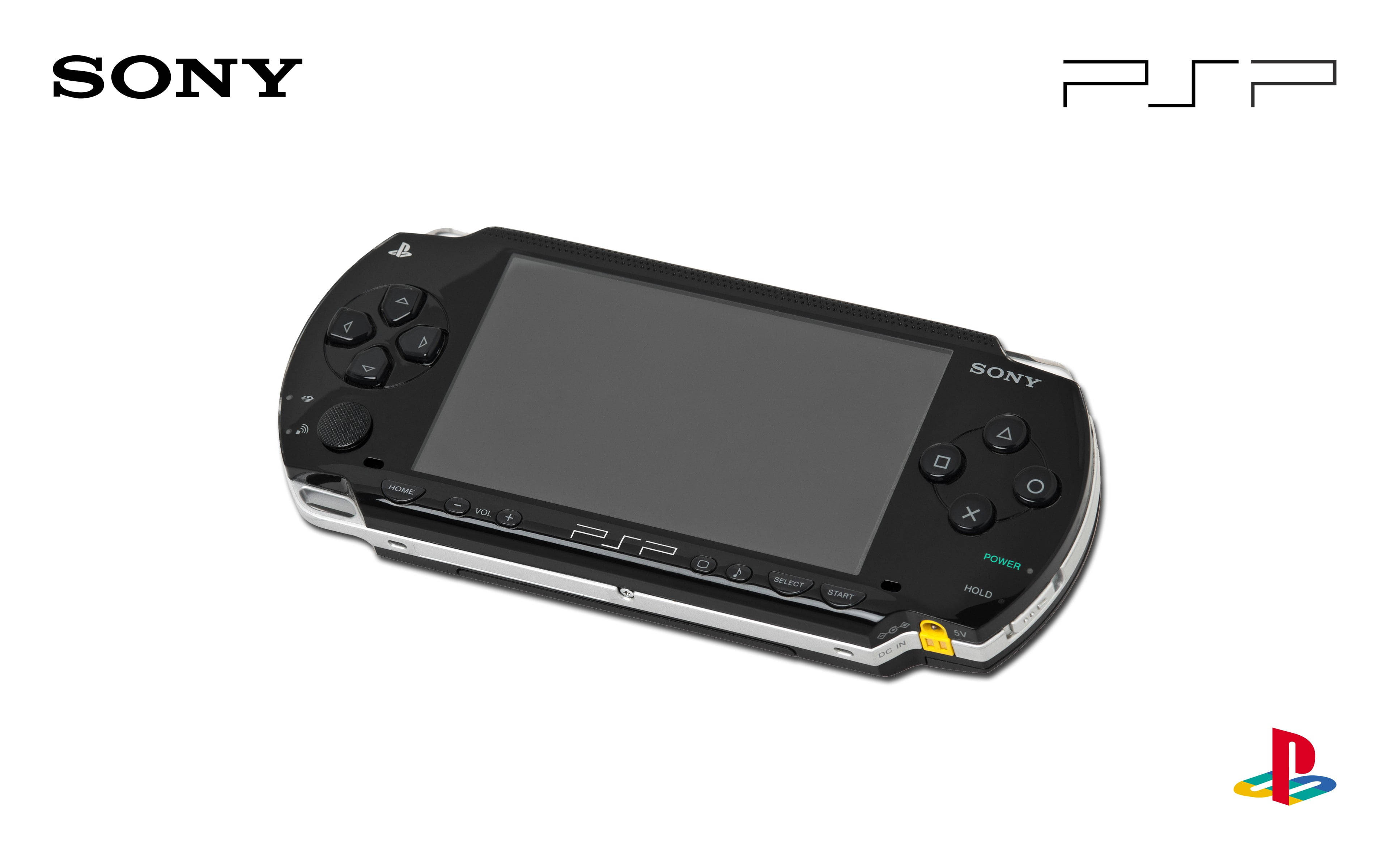 遊戲 桌布 壁紙 — 一部時尚的黑色 Sony PSP 手提遊戲機，帶有銀色飾邊和可見按鈕，置於潔白背景前。