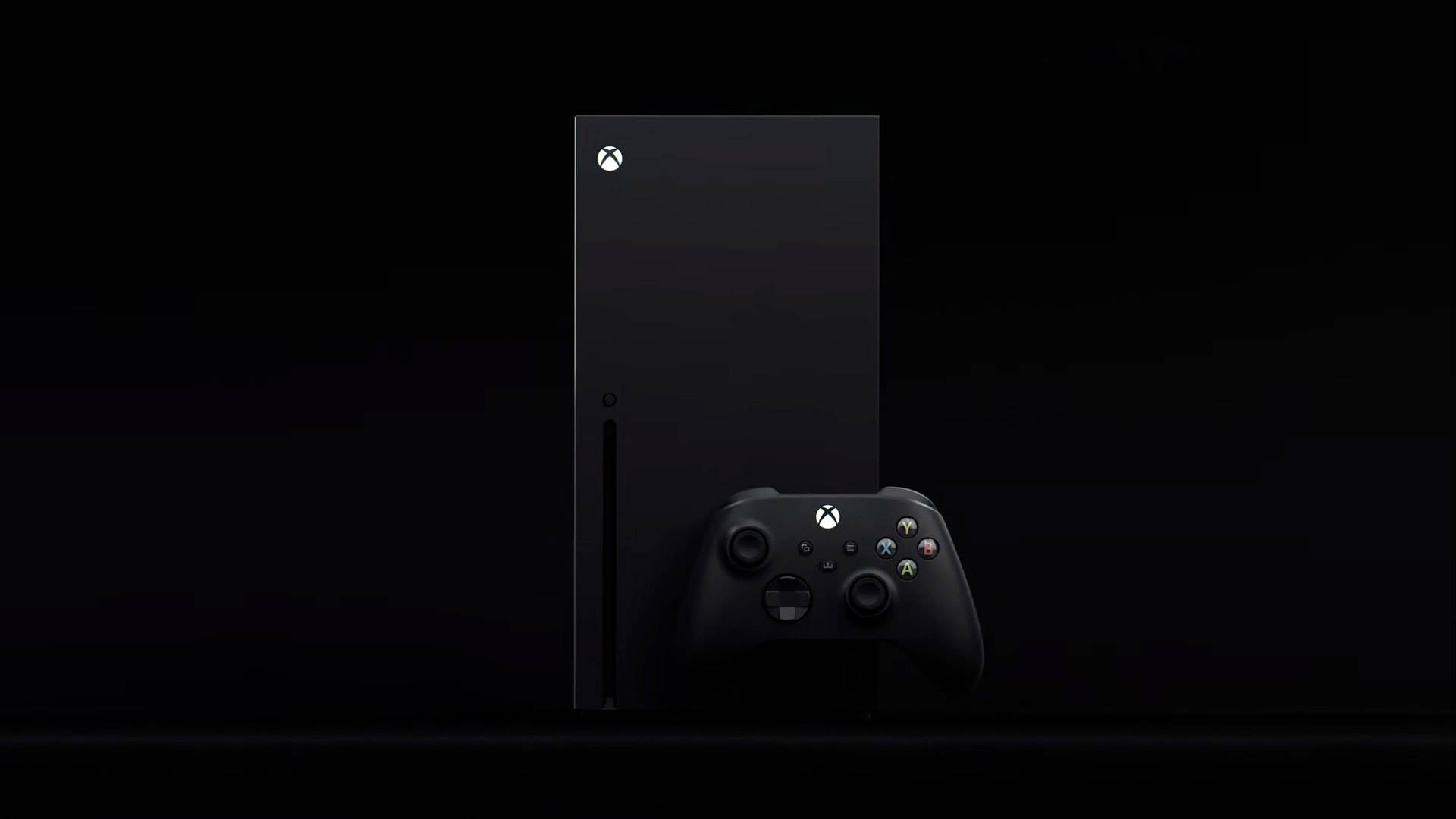 Xbox 桌布 壁紙 — 一部時尚的黑色 Xbox Series X 主機和控制器在黑暗背景中亮起。